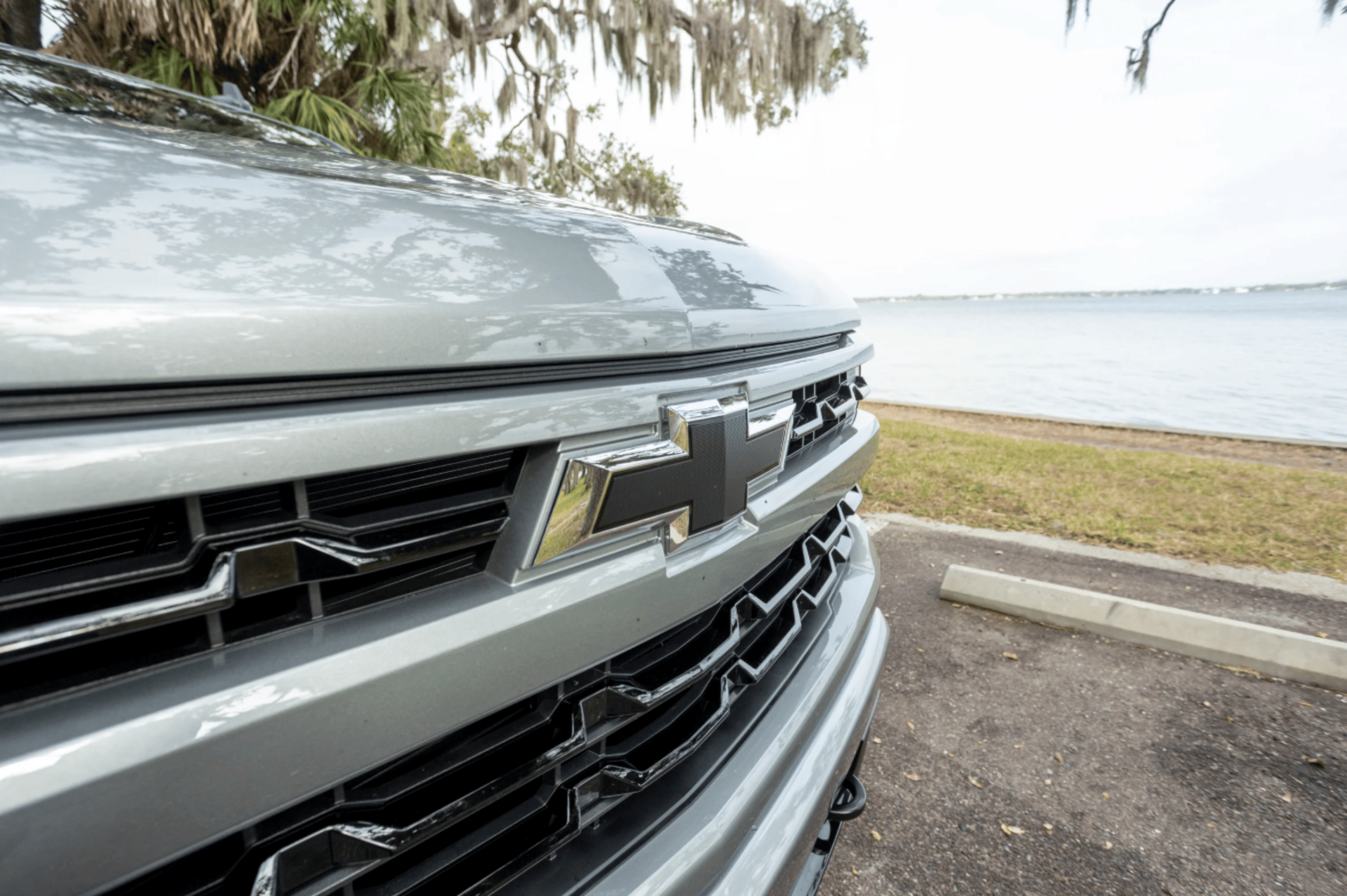 a red sports car parked in a parking lot