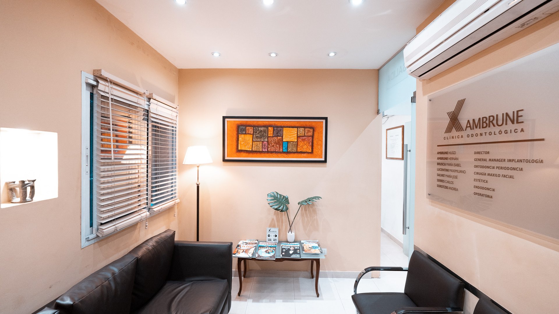 black and brown leather padded tub sofa