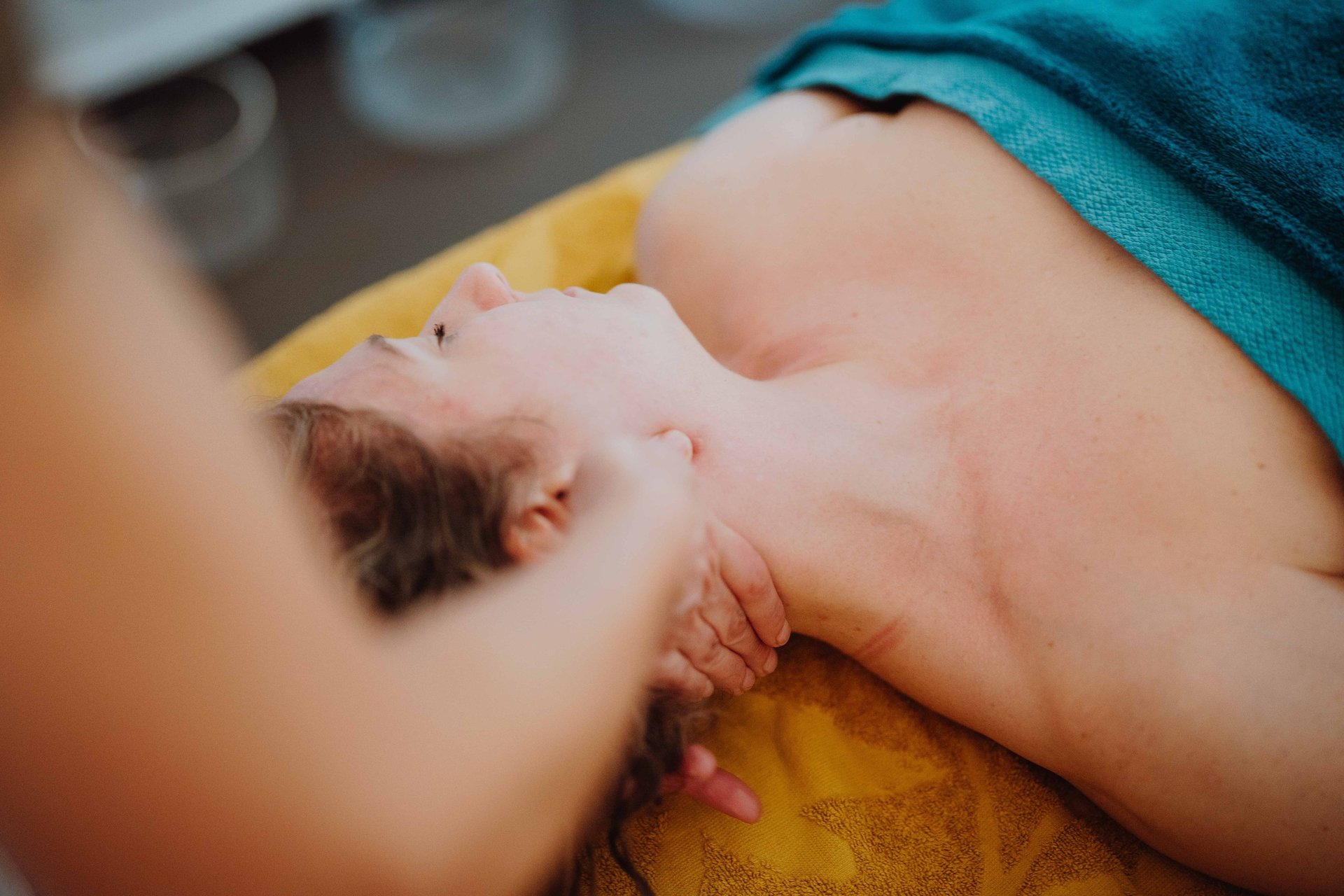 an abstract photo of a curved building with a blue sky in the background