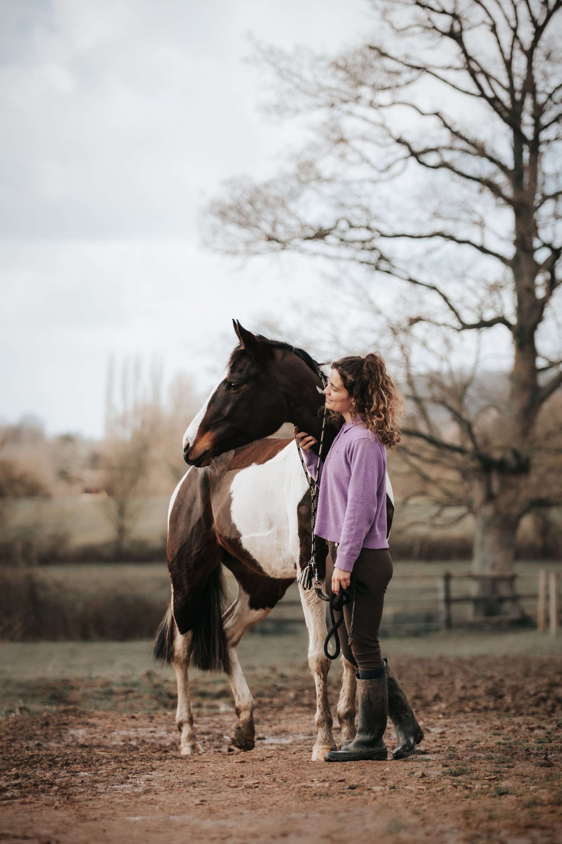 black and brown leather padded tub sofa