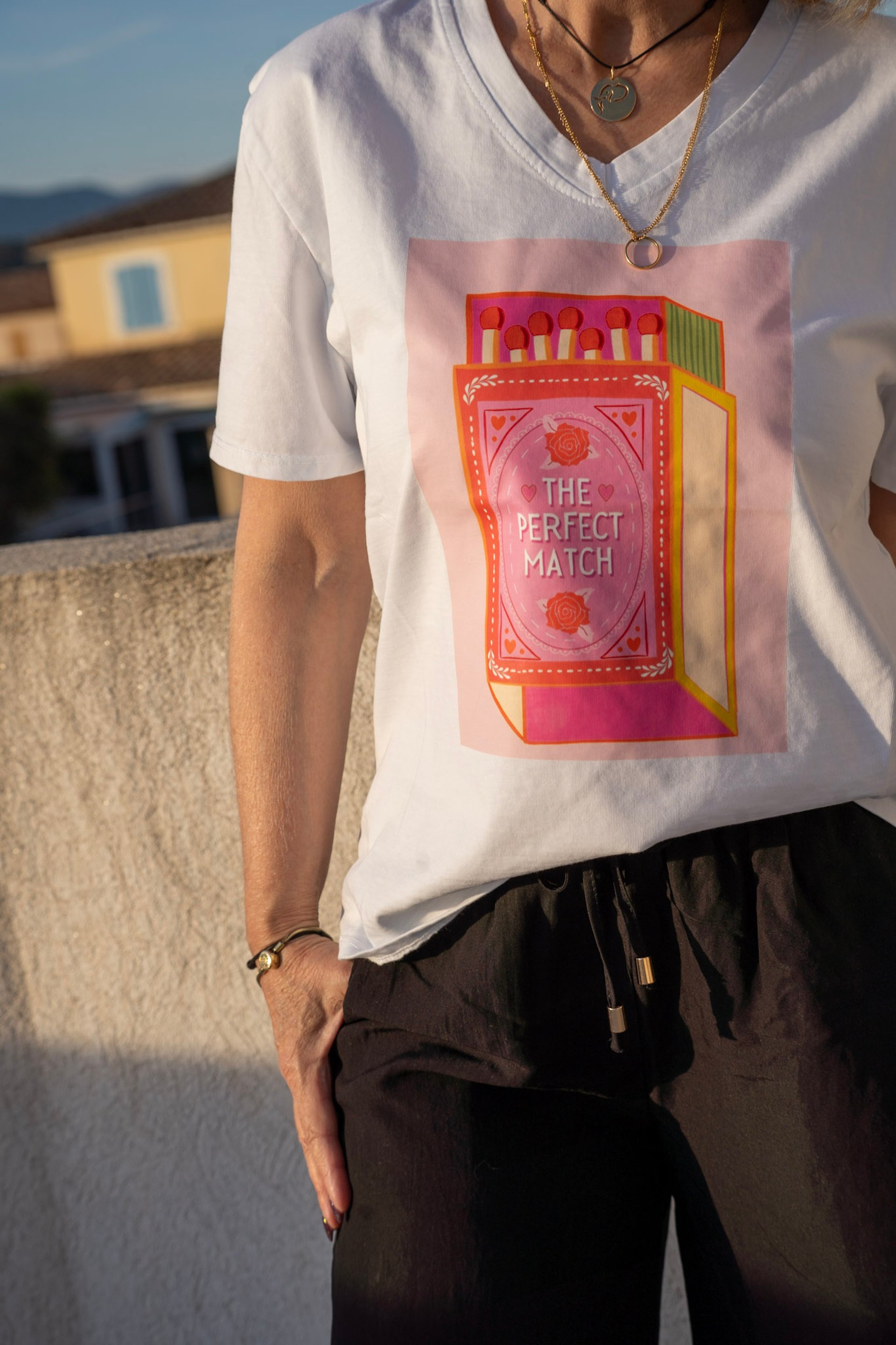 woman holding dried flower