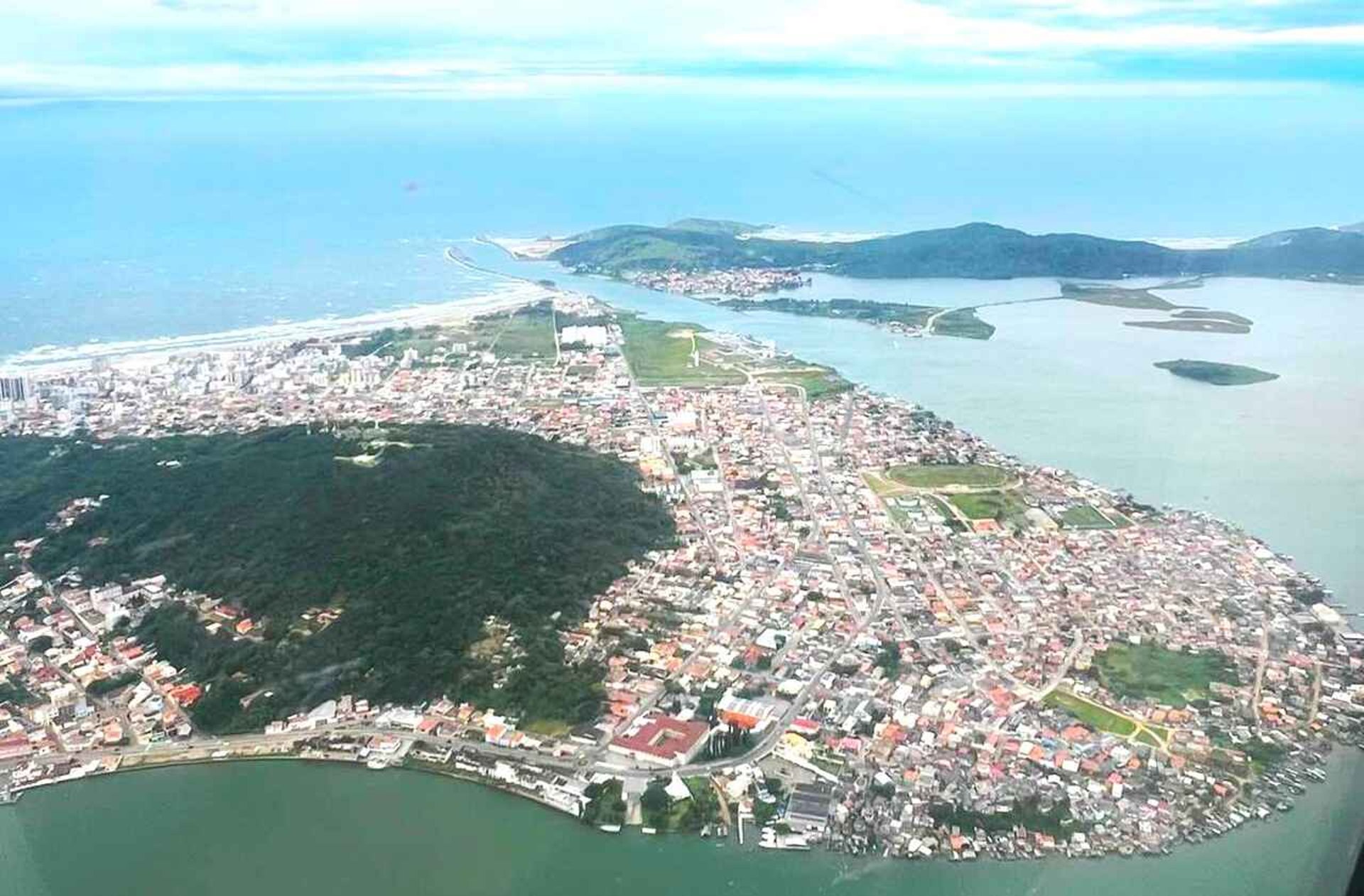 low angle photo of city high rise buildings during daytime