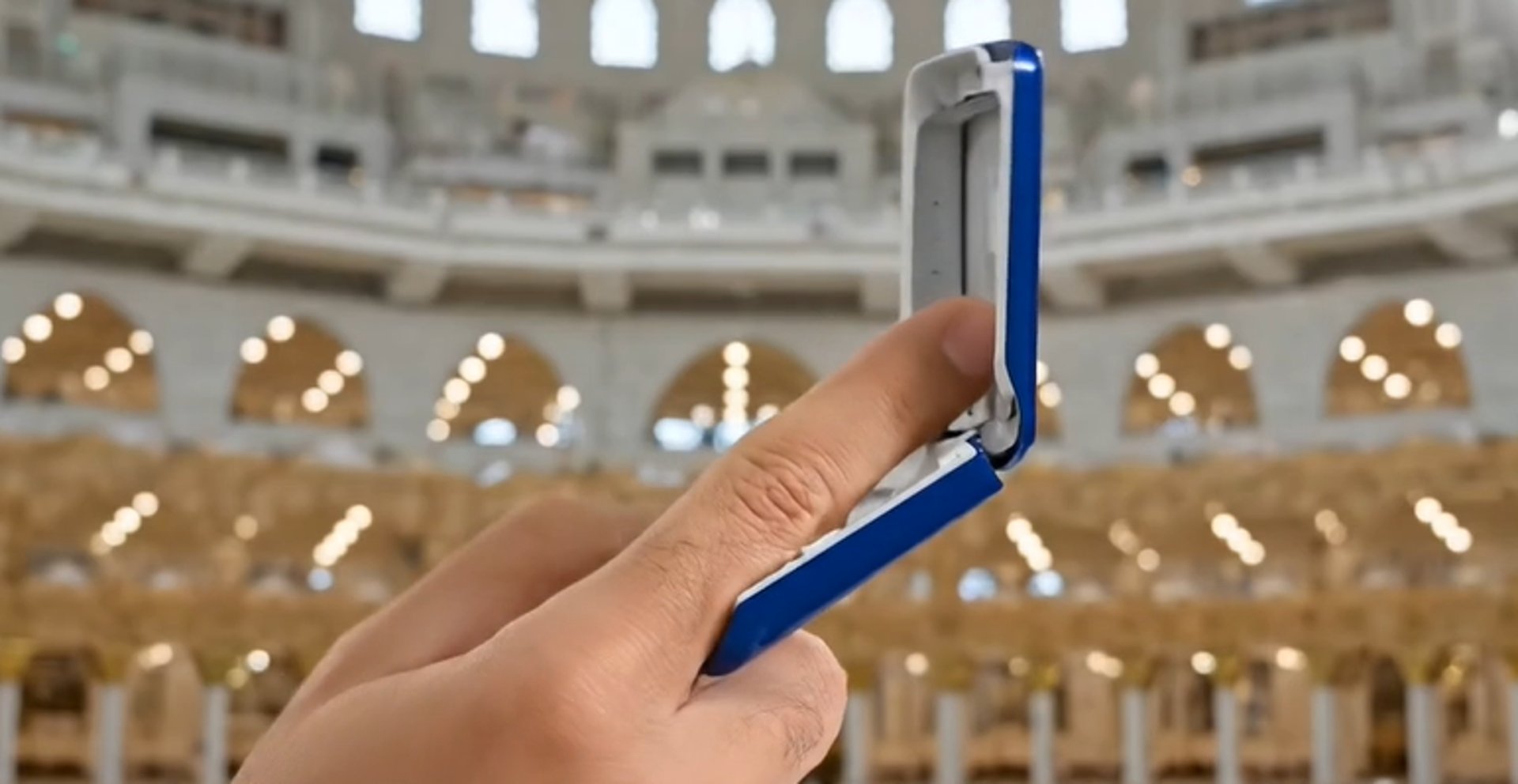 people walking on snow covered field near brown concrete building during daytime
