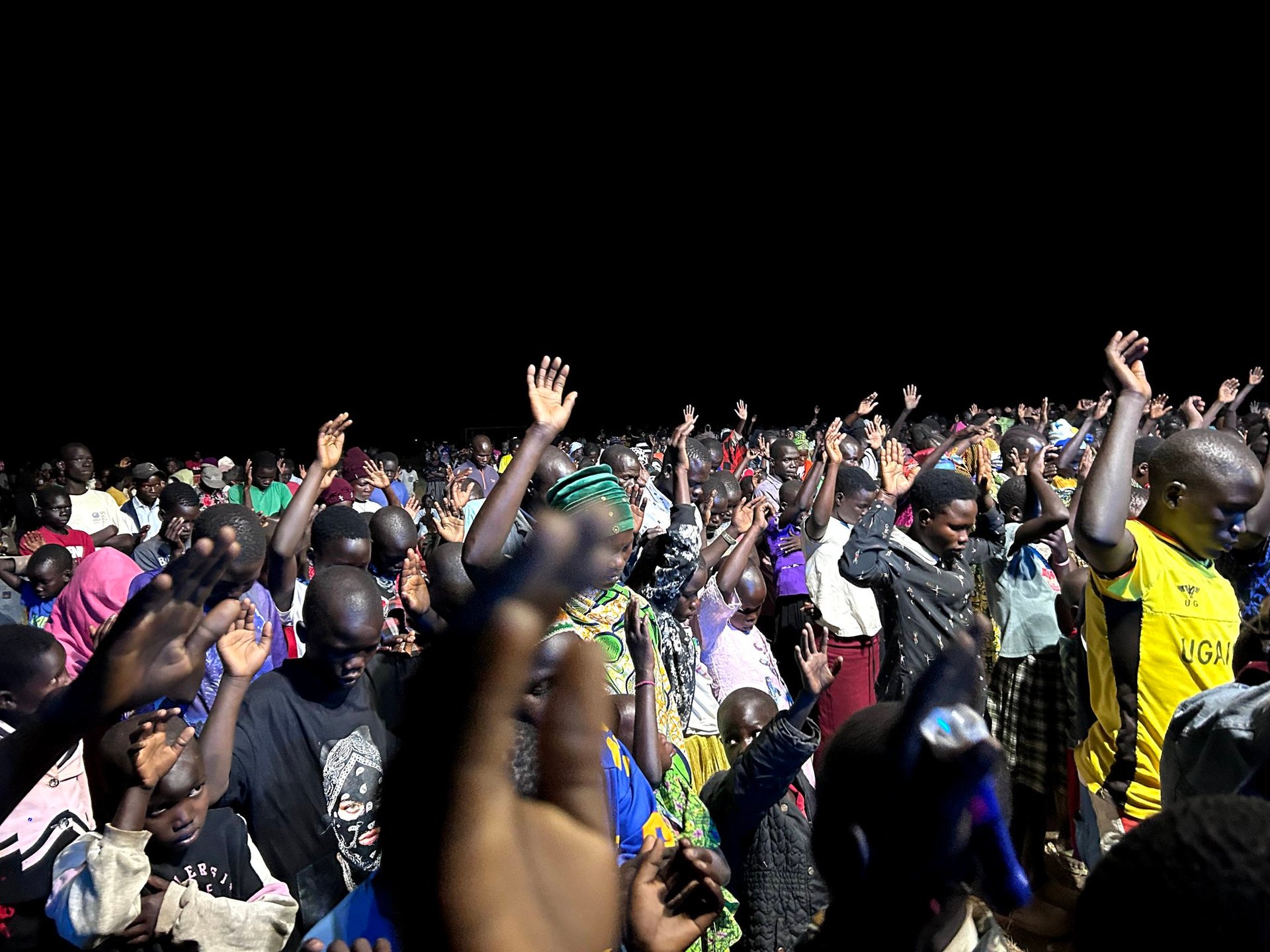an abstract photo of a curved building with a blue sky in the background