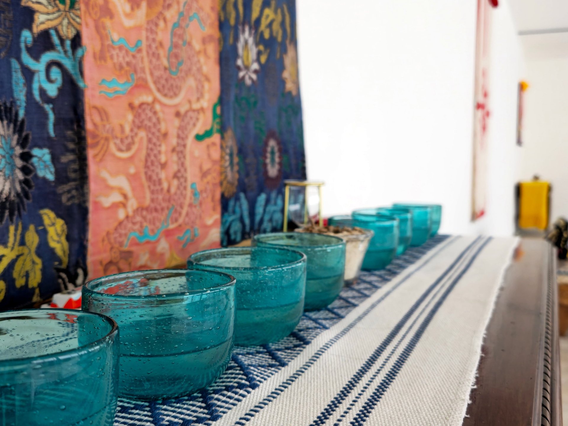 an abstract photo of a curved building with a blue sky in the background
