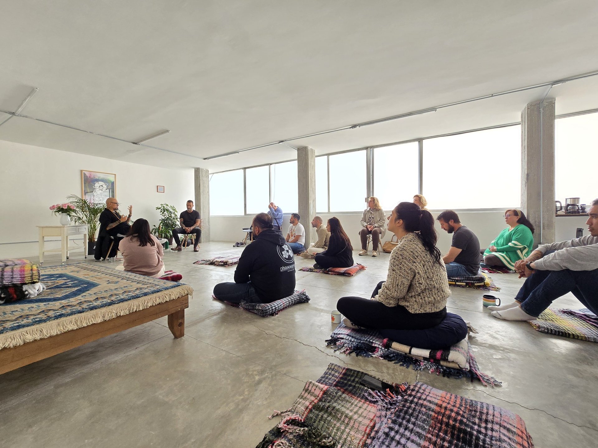an abstract photo of a curved building with a blue sky in the background