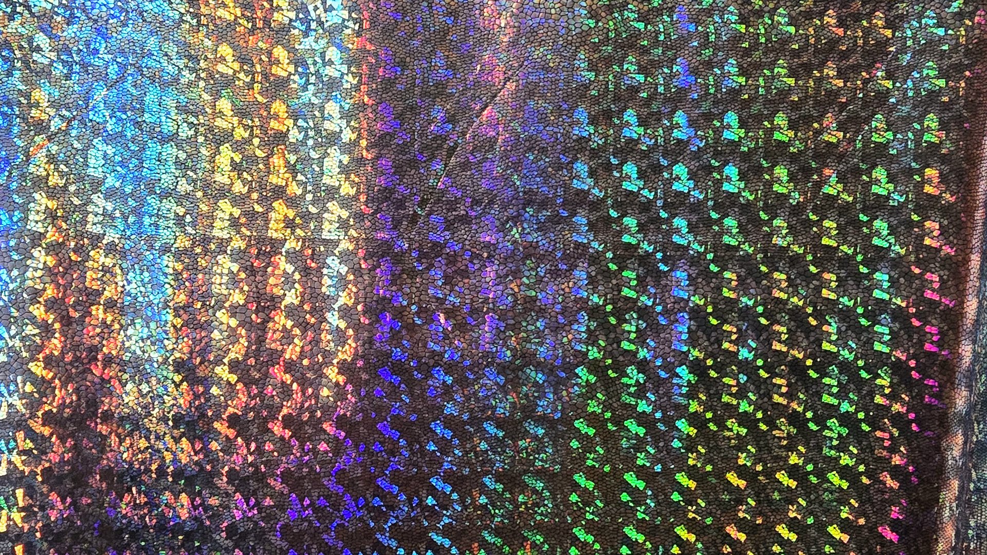 Holographic material ready to be crafted into a sash
