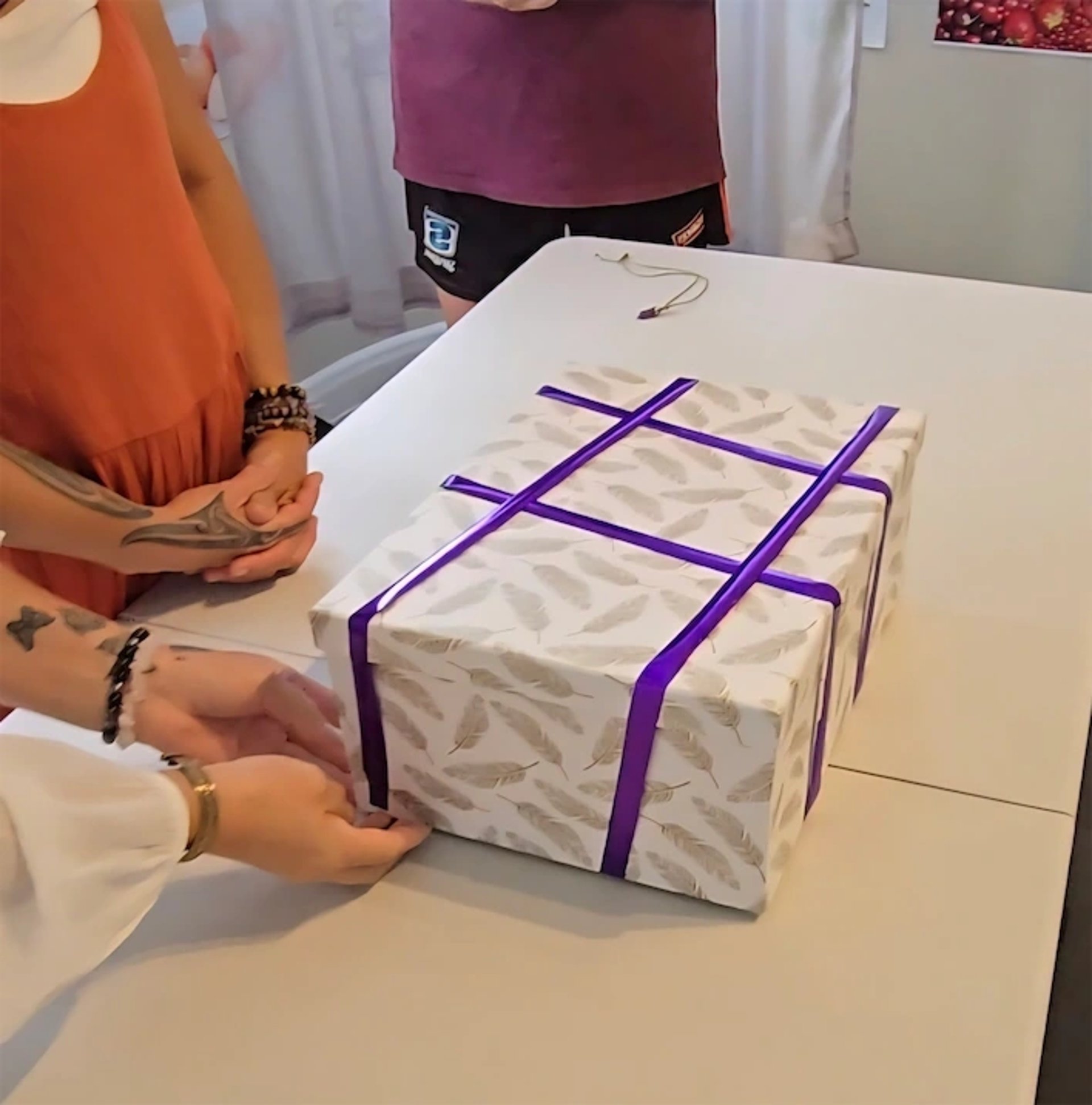 Gift box with holographic ribbon
