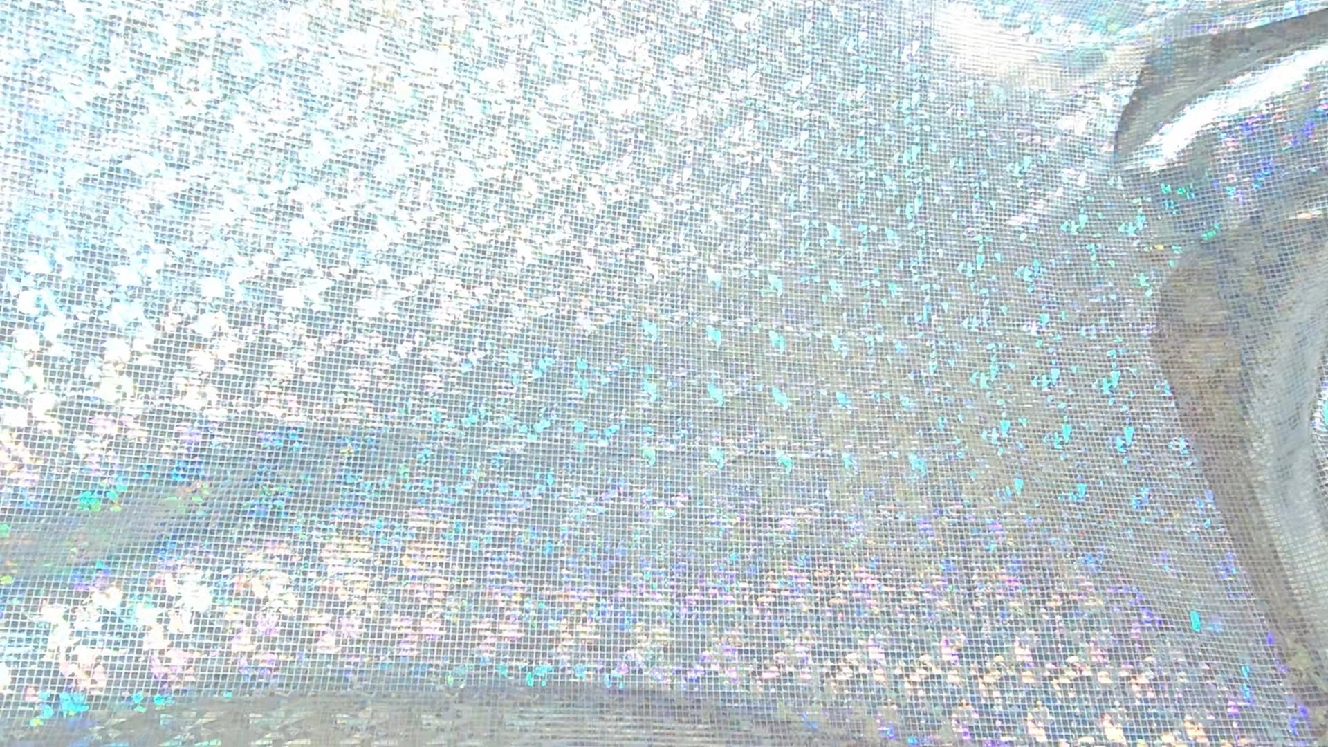 Holographic material ready to be crafted into a sash