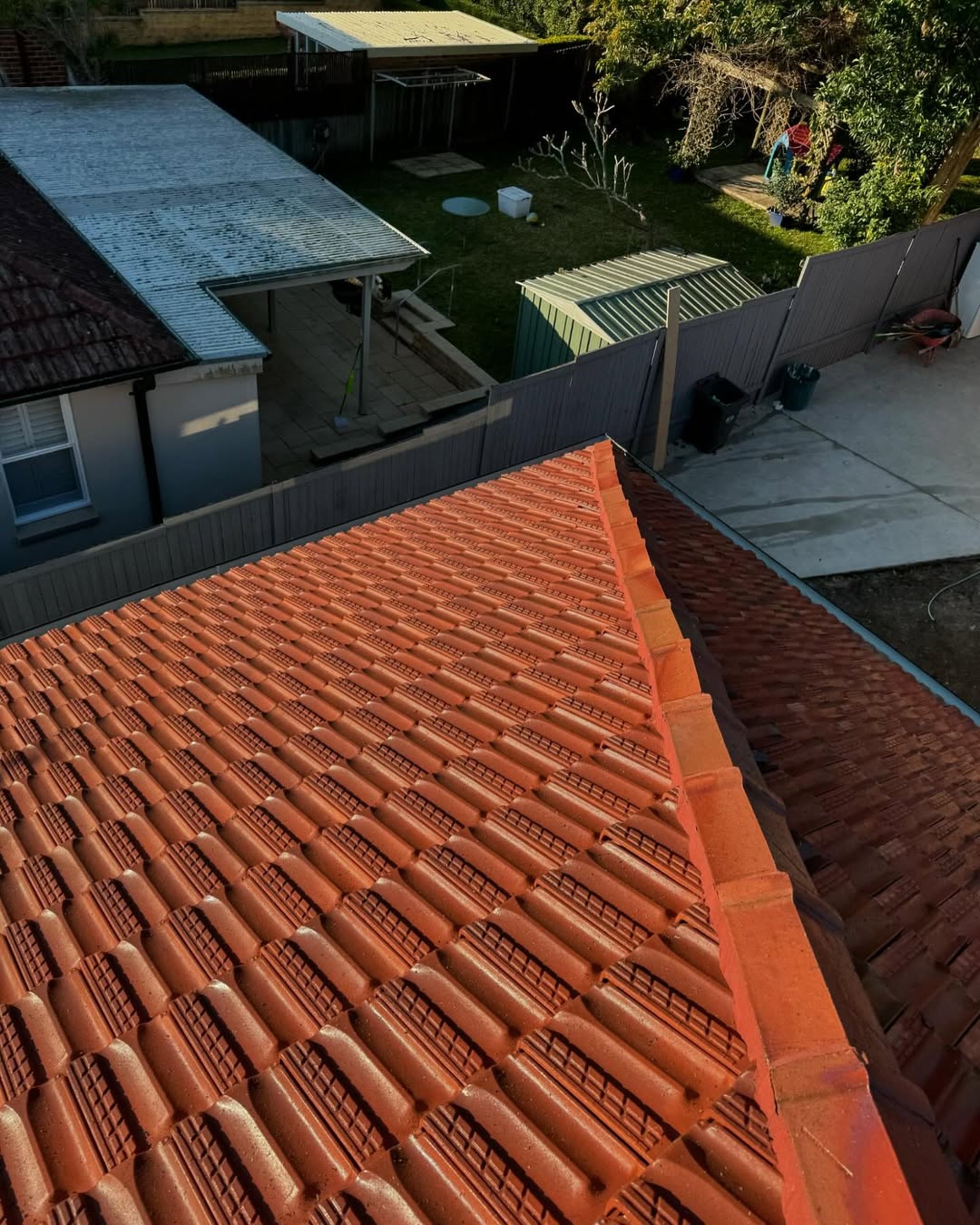 black and brown leather padded tub sofa