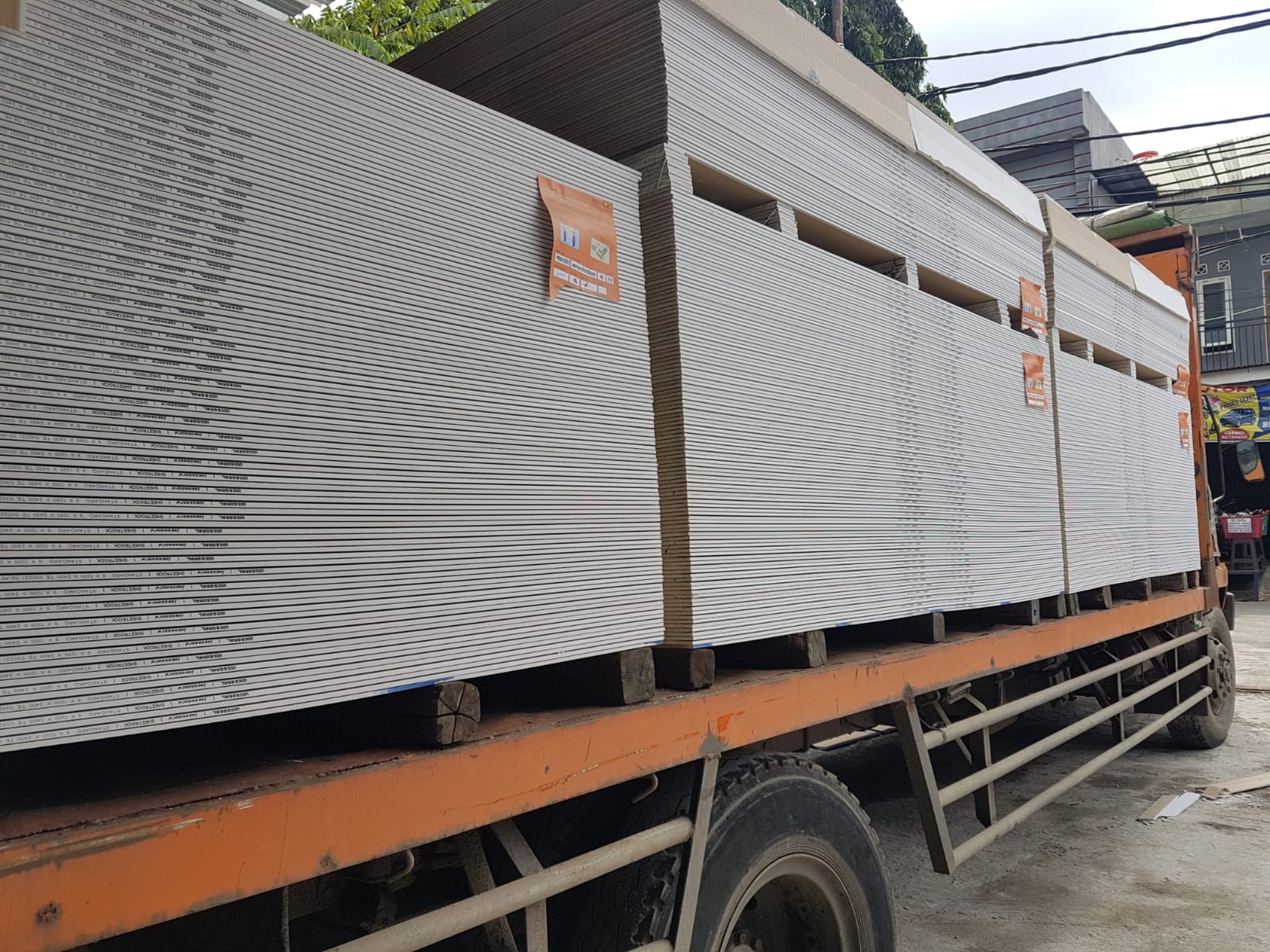 black and brown leather padded tub sofa