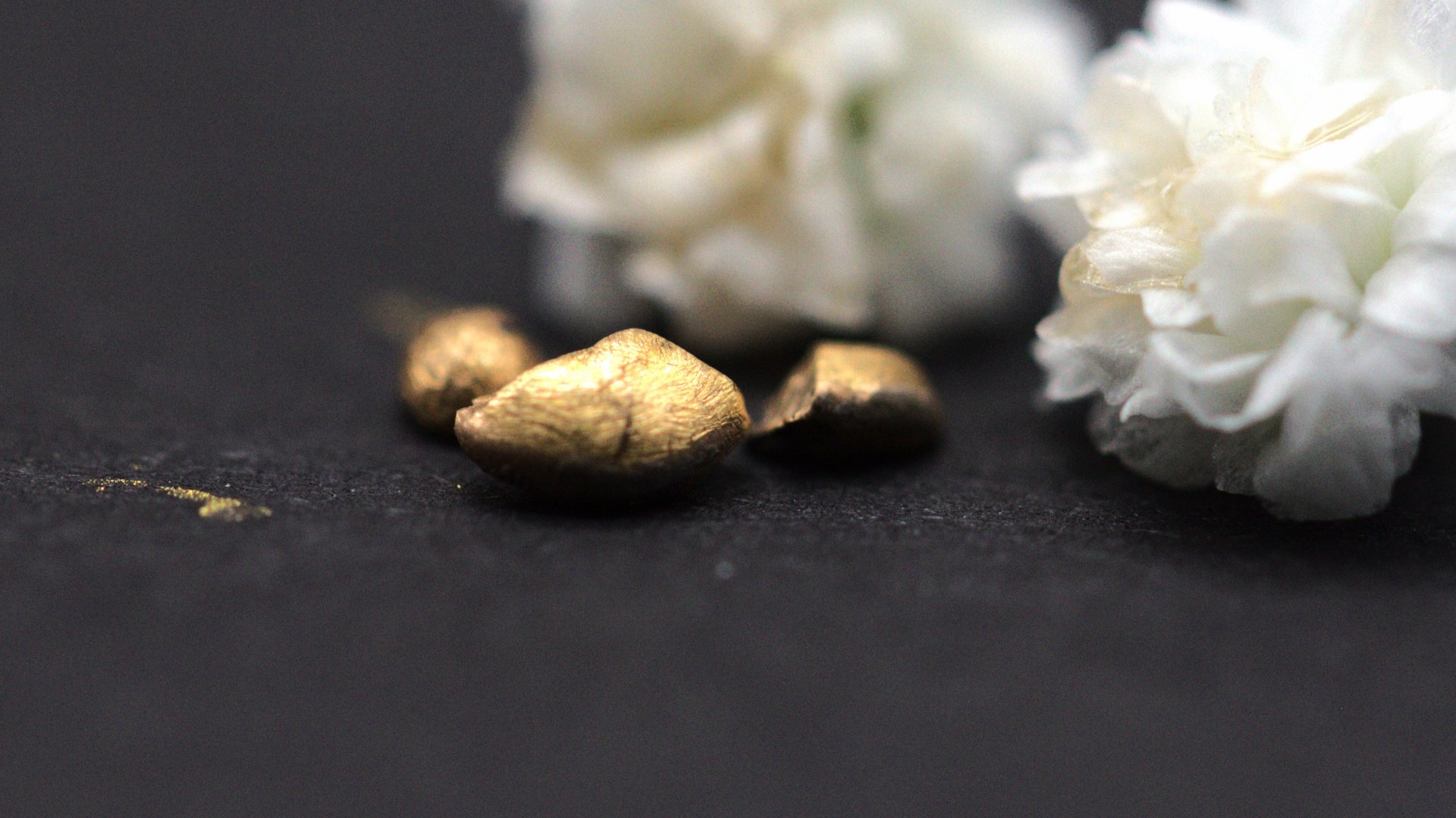 an abstract photo of a curved building with a blue sky in the background