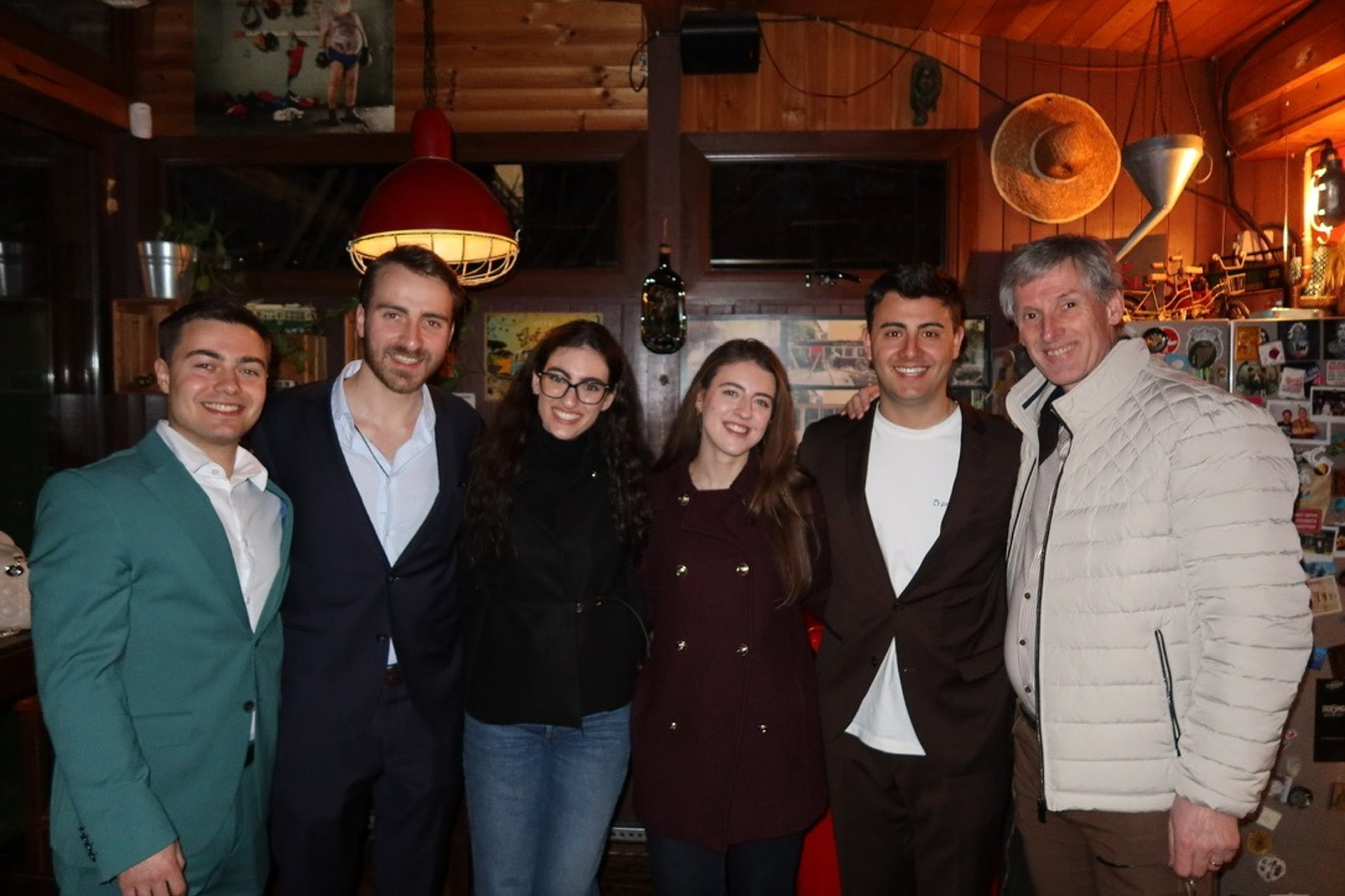 an abstract photo of a curved building with a blue sky in the background