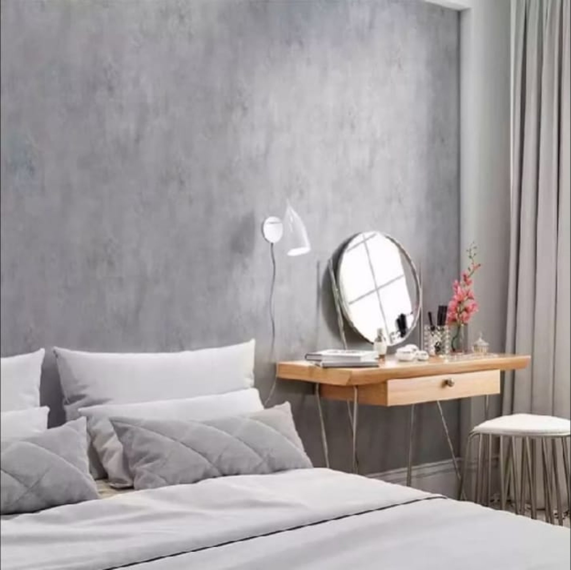 an abstract photo of a curved building with a blue sky in the background