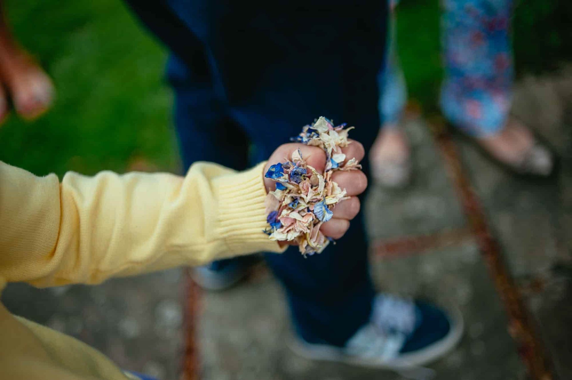 Couple laughing in gardens at Tall John’s House Brecon Beacons, romantic and natural wedding photo