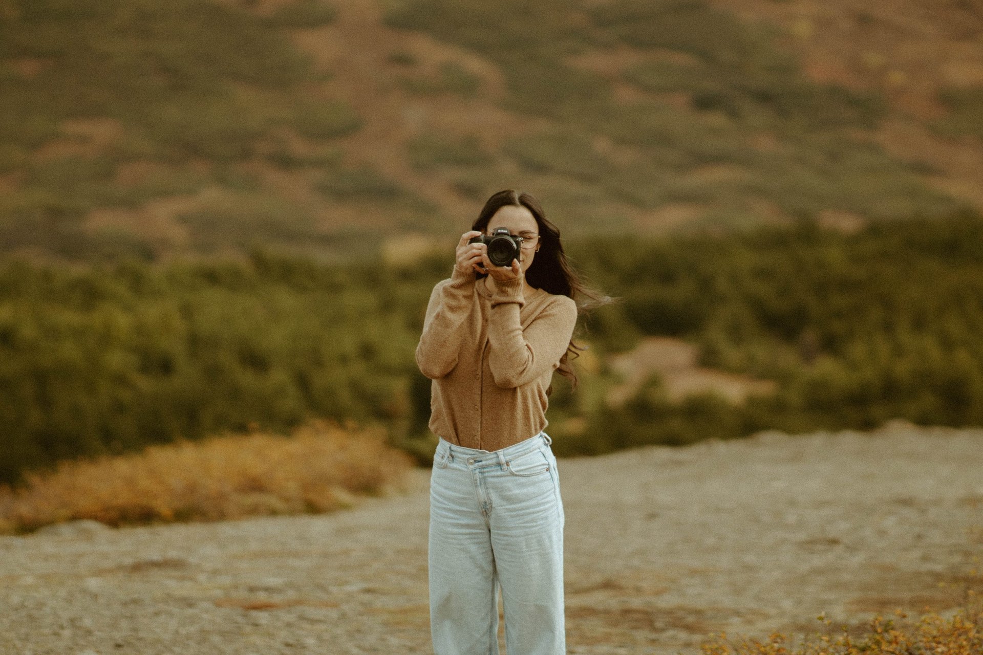an abstract photo of a curved building with a blue sky in the background