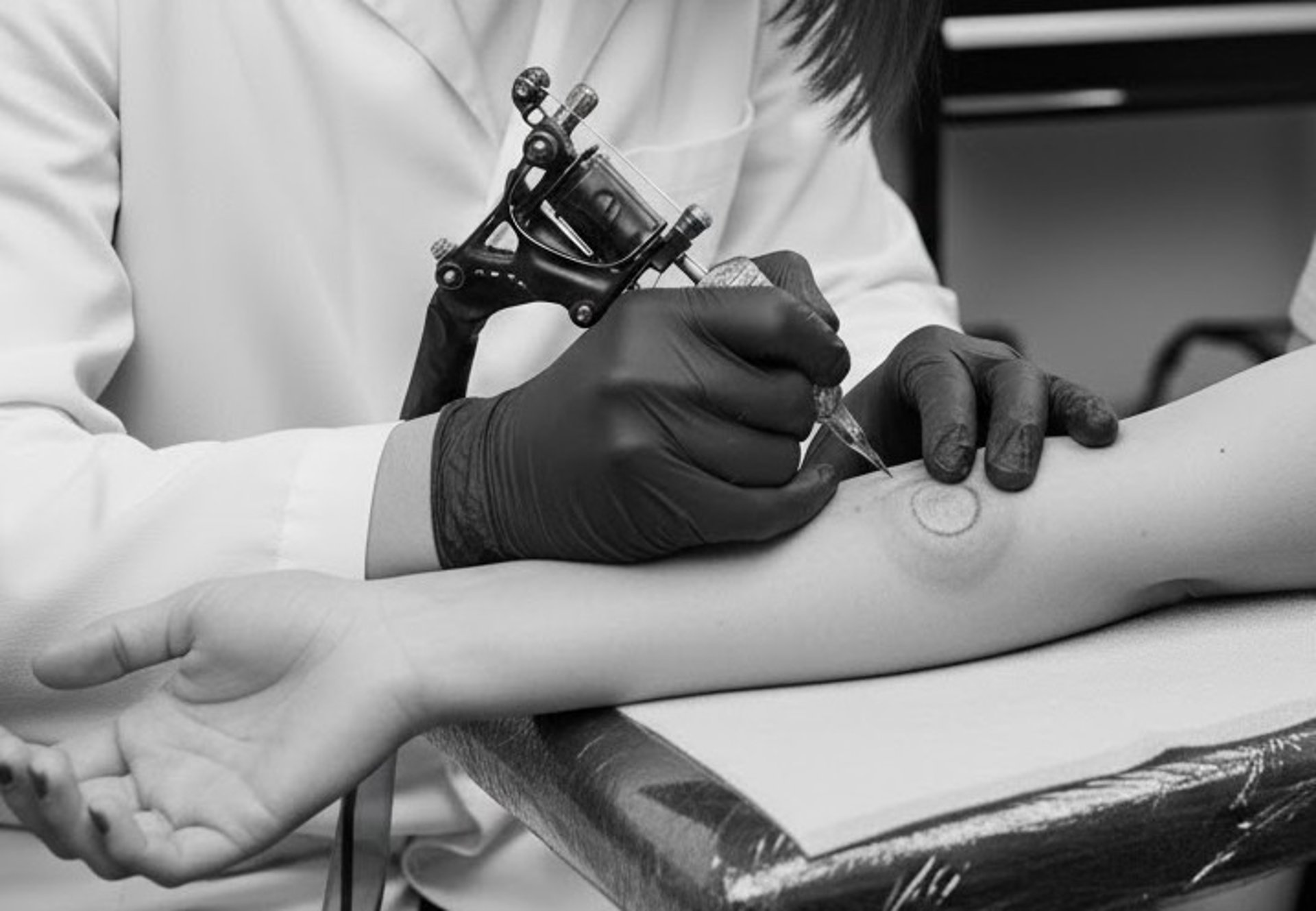 black and brown leather padded tub sofa