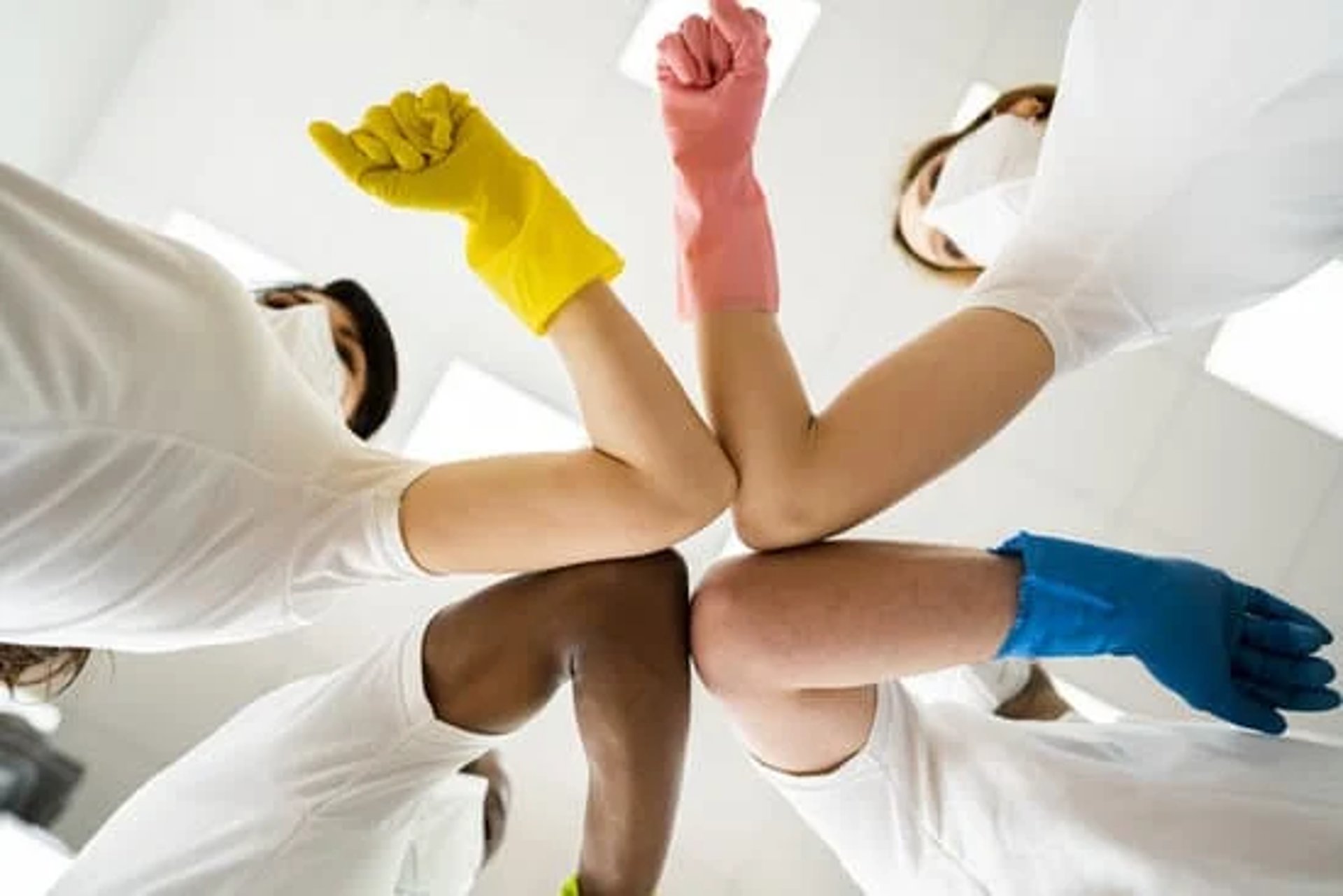 woman wearing yellow long-sleeved dress under white clouds and blue sky during daytime