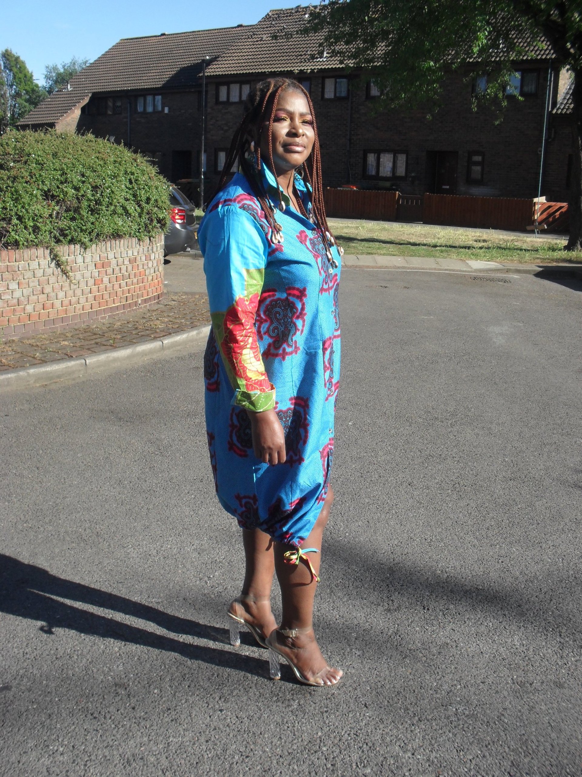 a woman in a colorful dress