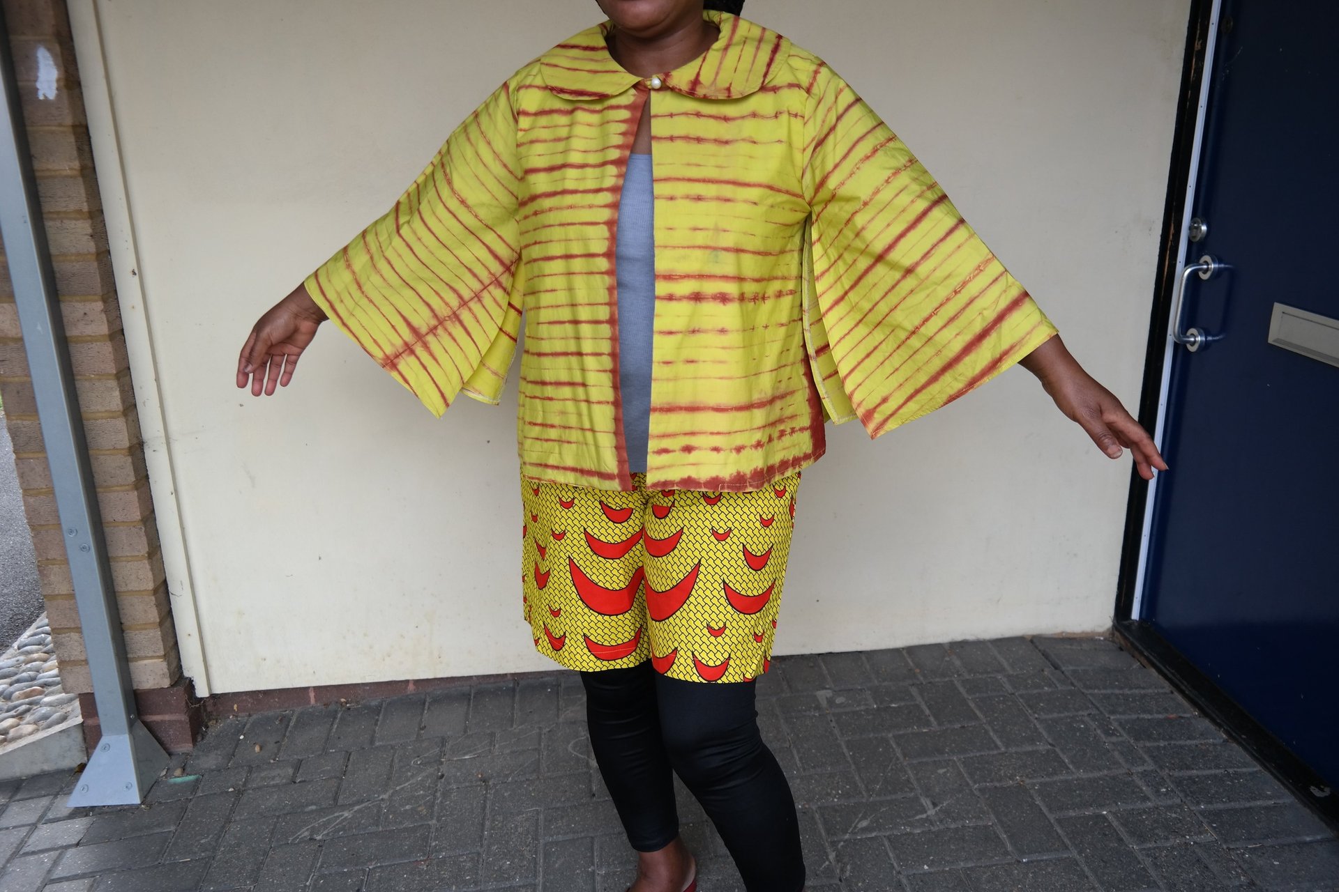 a woman in a colorful dress