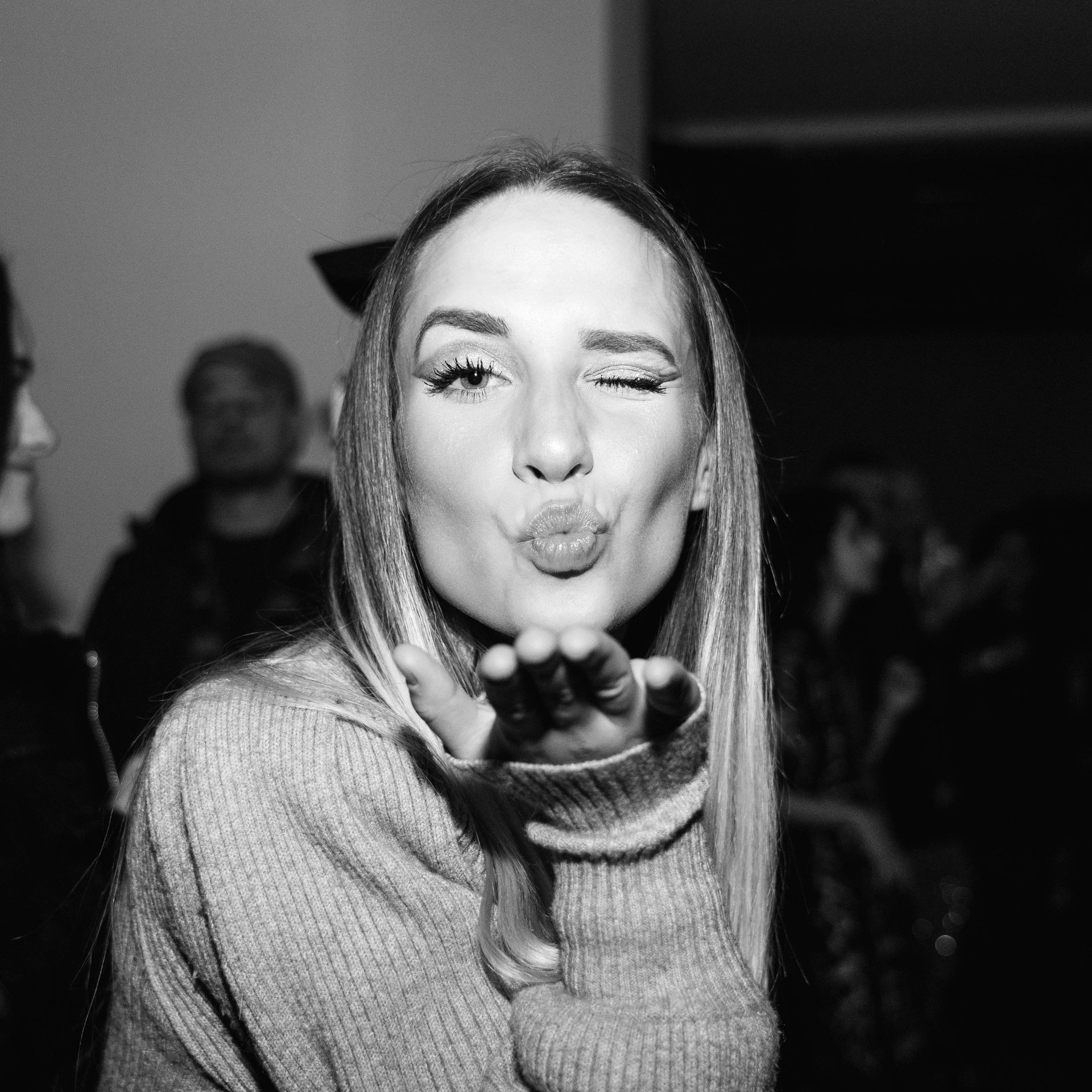 woman wearing yellow long-sleeved dress under white clouds and blue sky during daytime