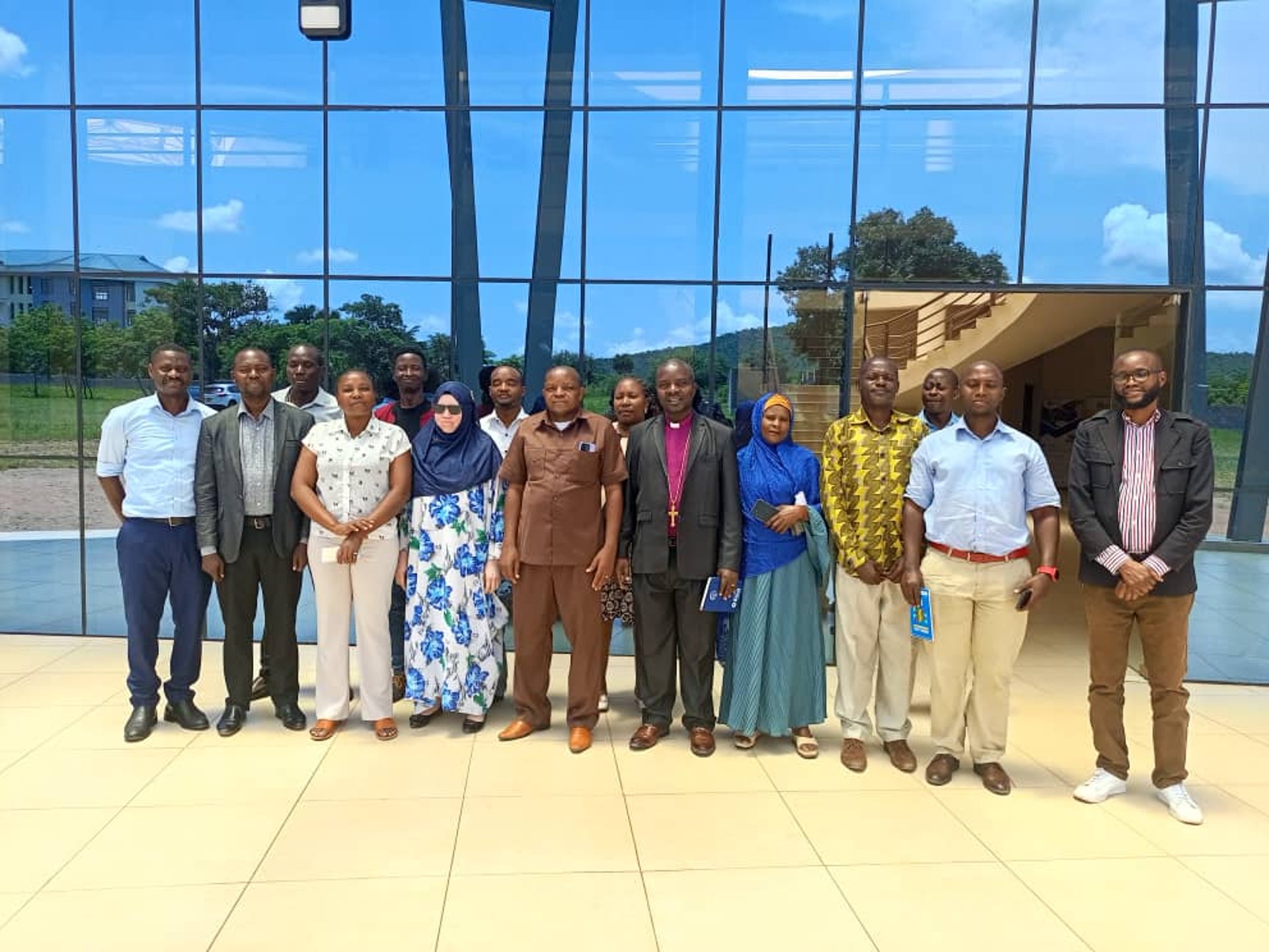 black and brown leather padded tub sofa