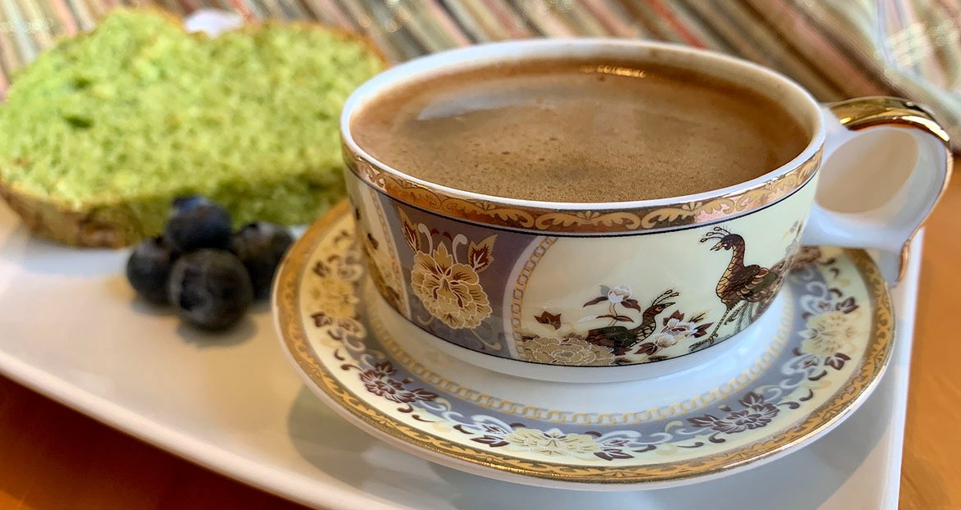 a cup of coffee and some money