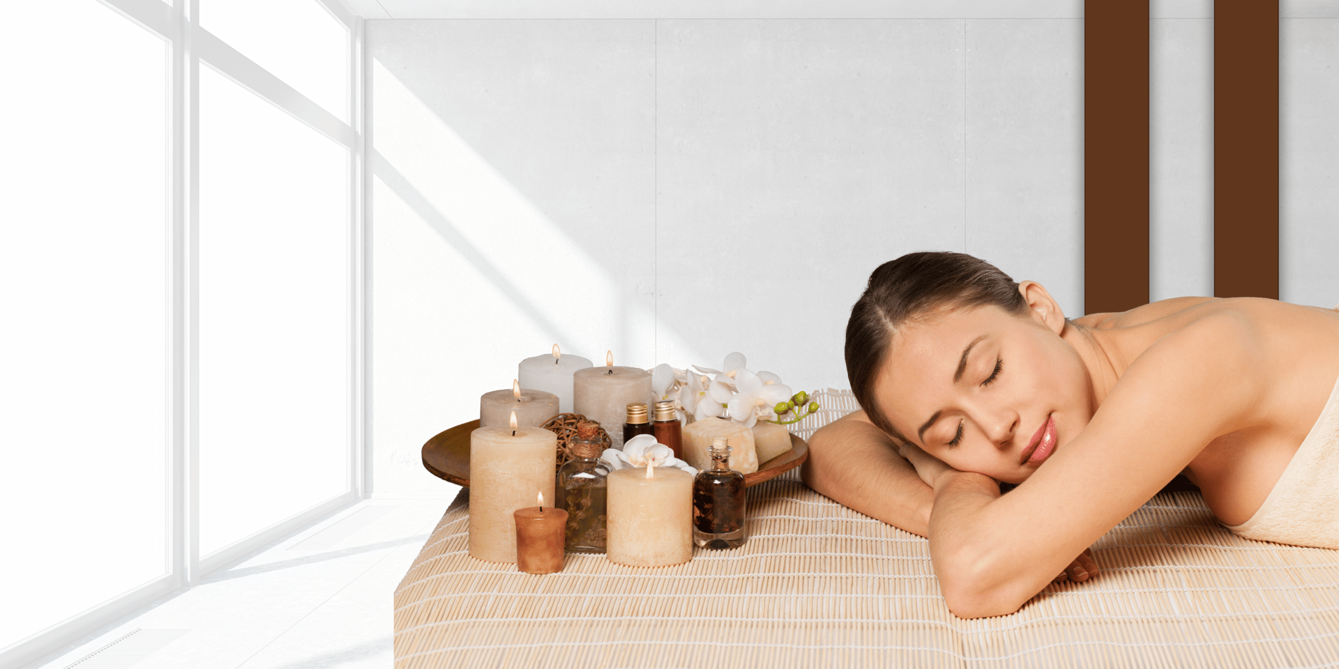 white plastic pump bottle beside pink tulips and gray towel