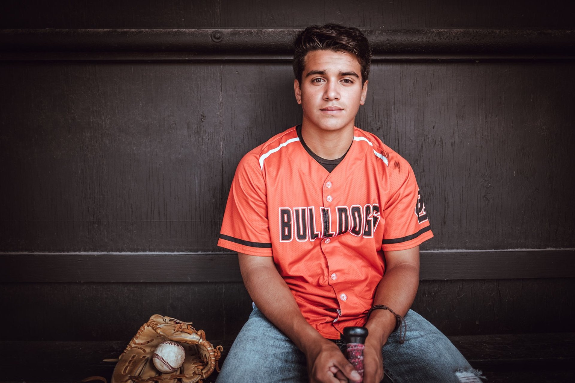 woman wearing yellow long-sleeved dress under white clouds and blue sky during daytime