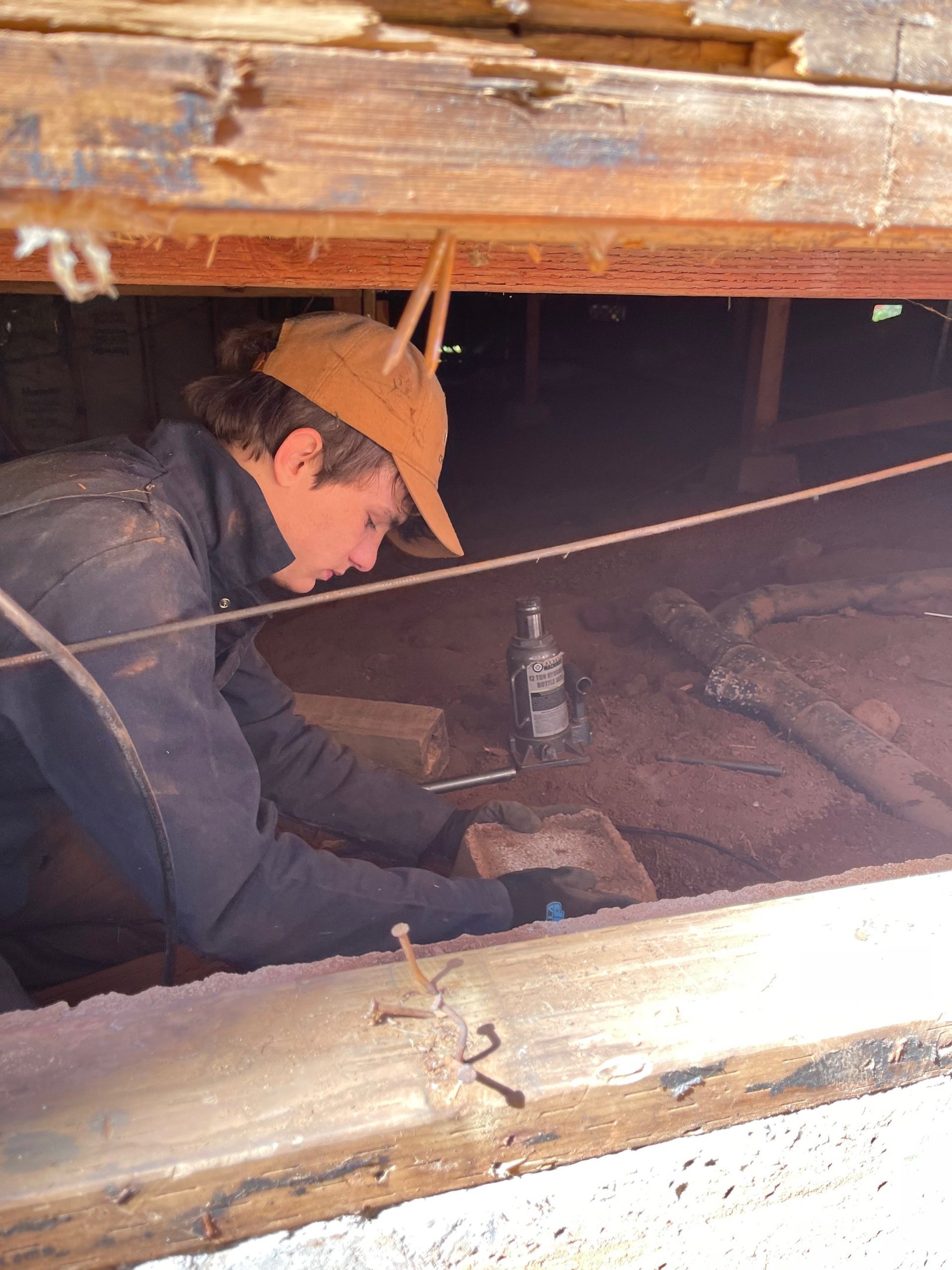 repairing water damage in the crawl space. Fixing the dry rot.