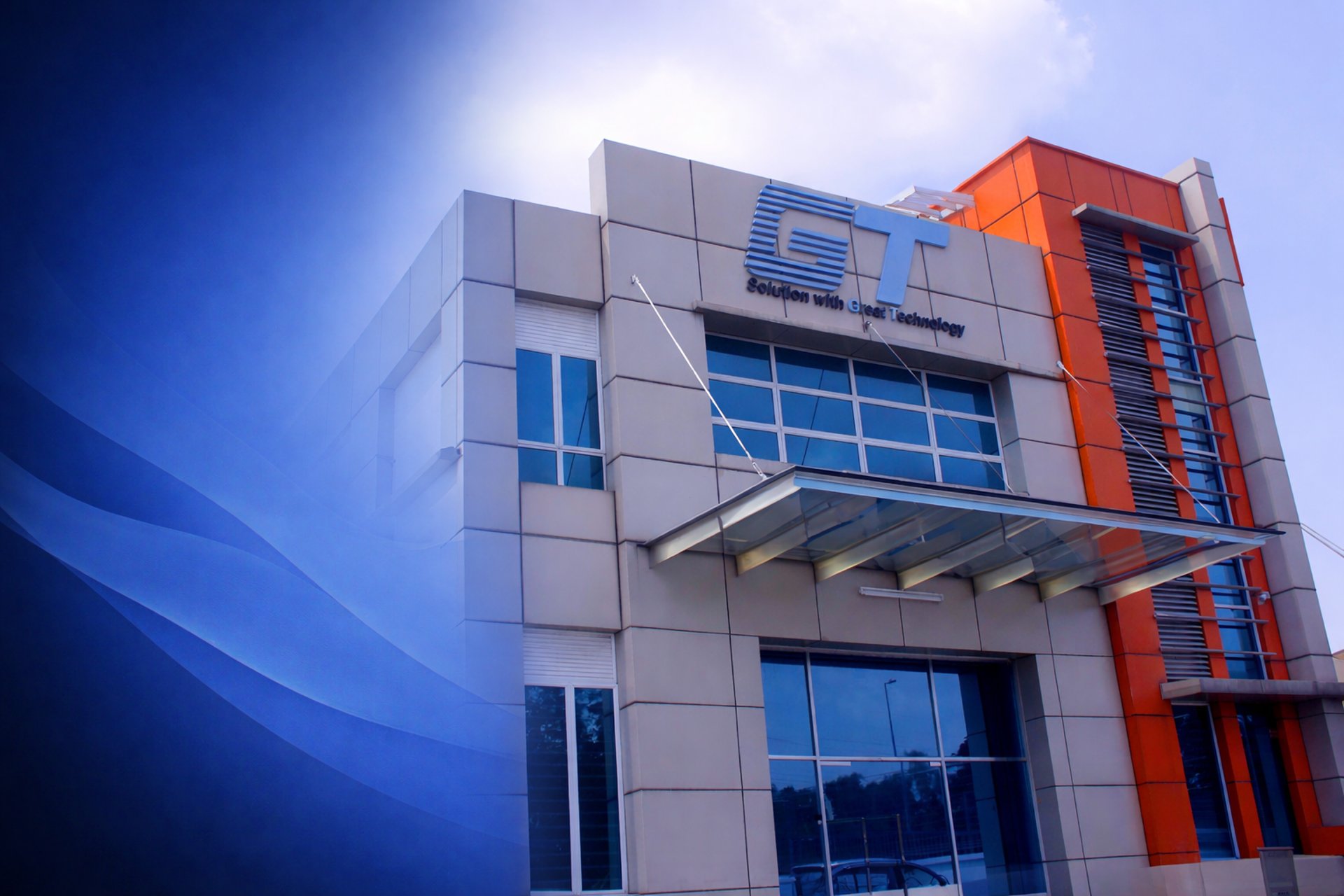 an abstract photo of a curved building with a blue sky in the background