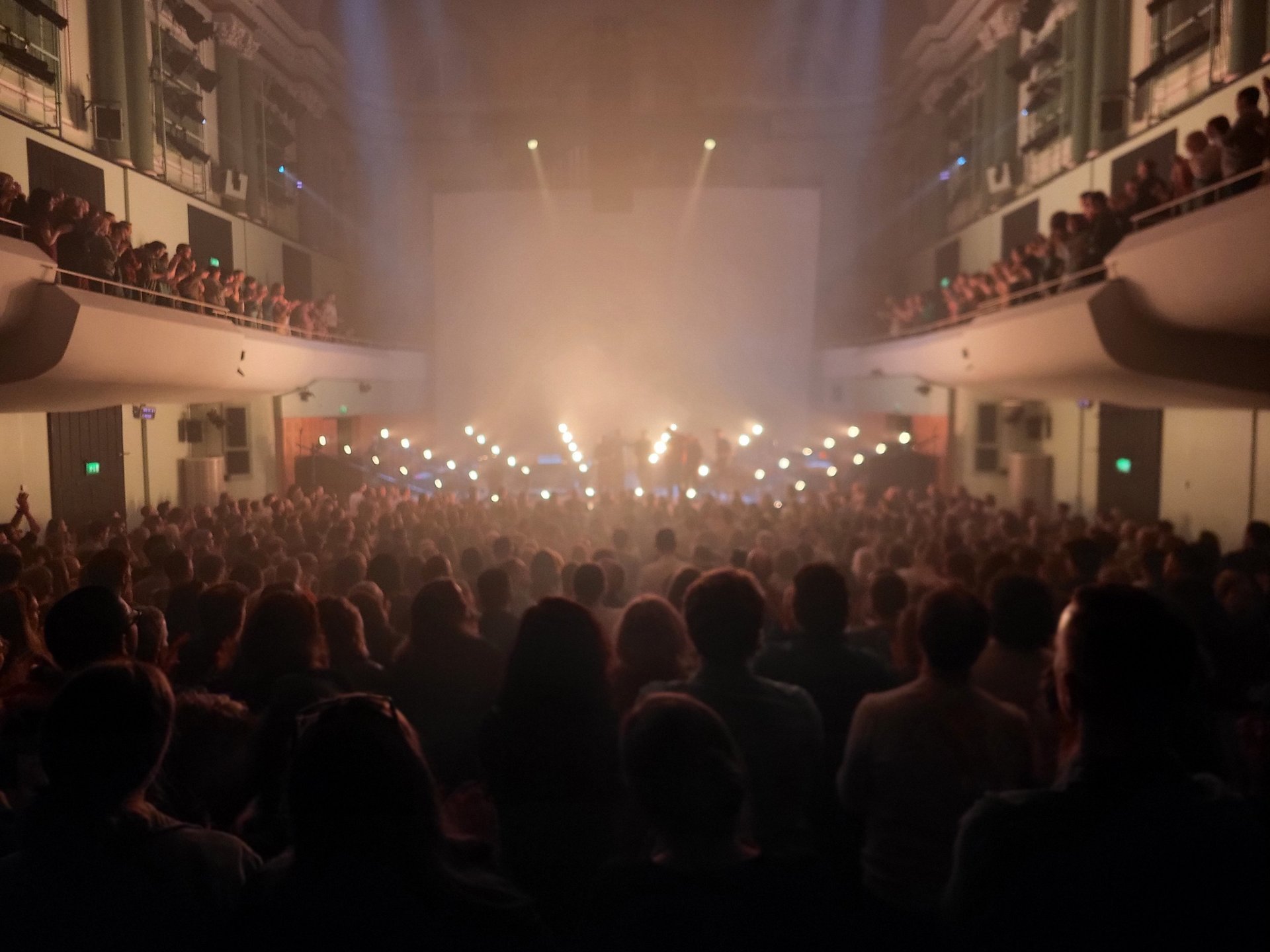 black and brown leather padded tub sofa