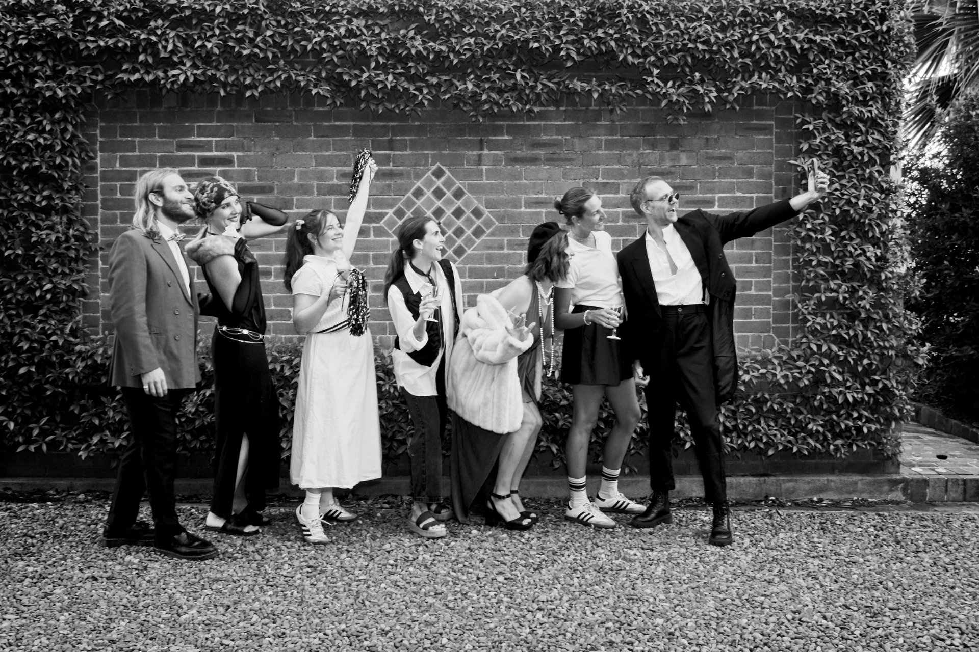 A group of people in a kitchen preparing food