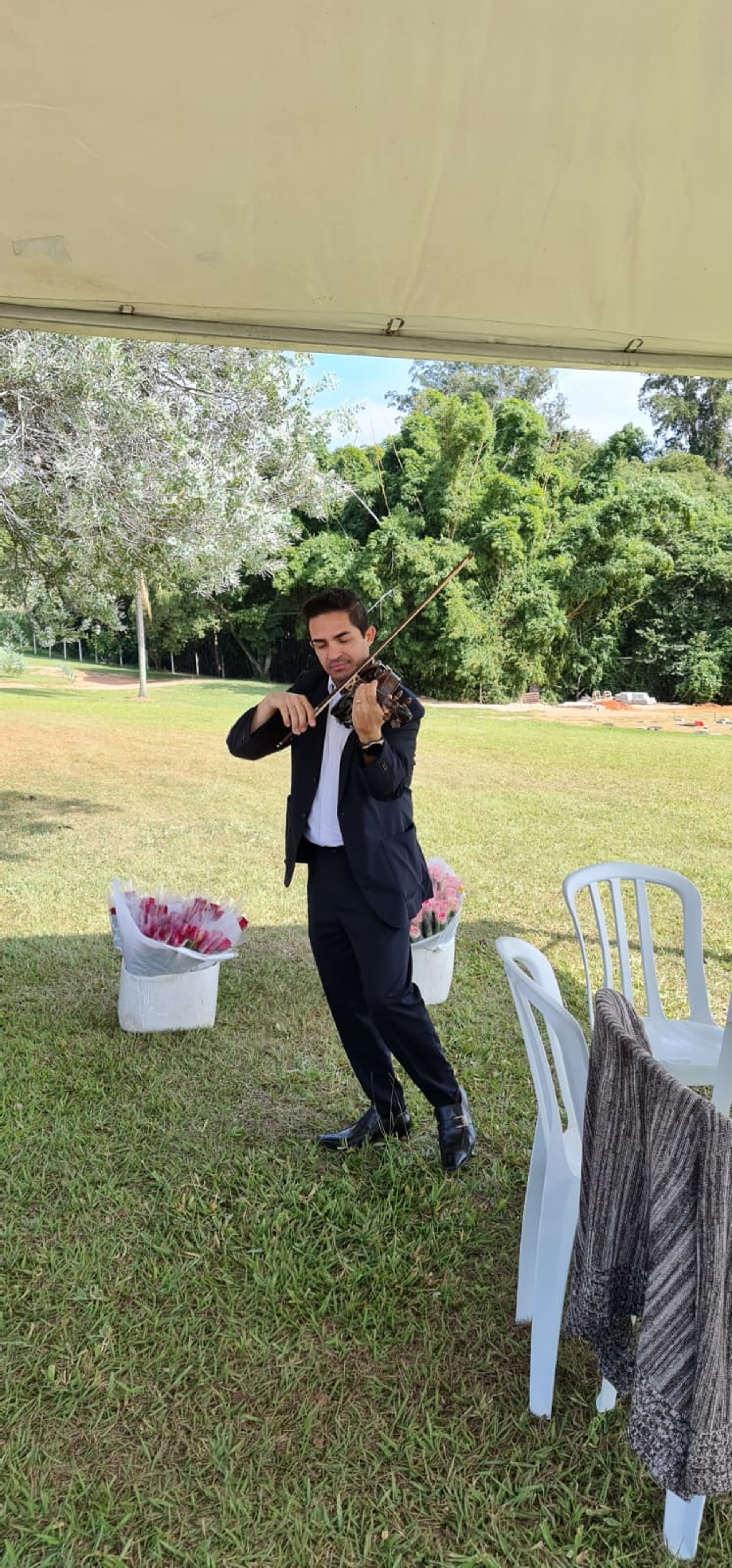 woman wearing yellow long-sleeved dress under white clouds and blue sky during daytime