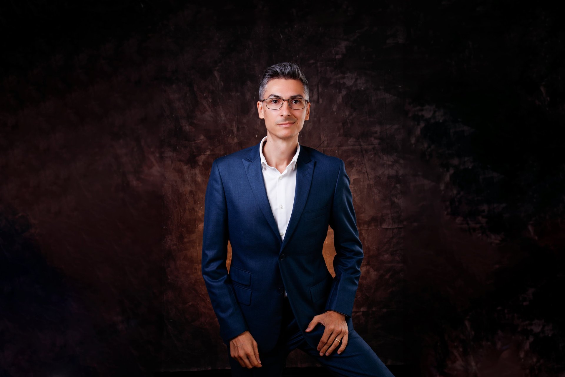 black and brown leather padded tub sofa