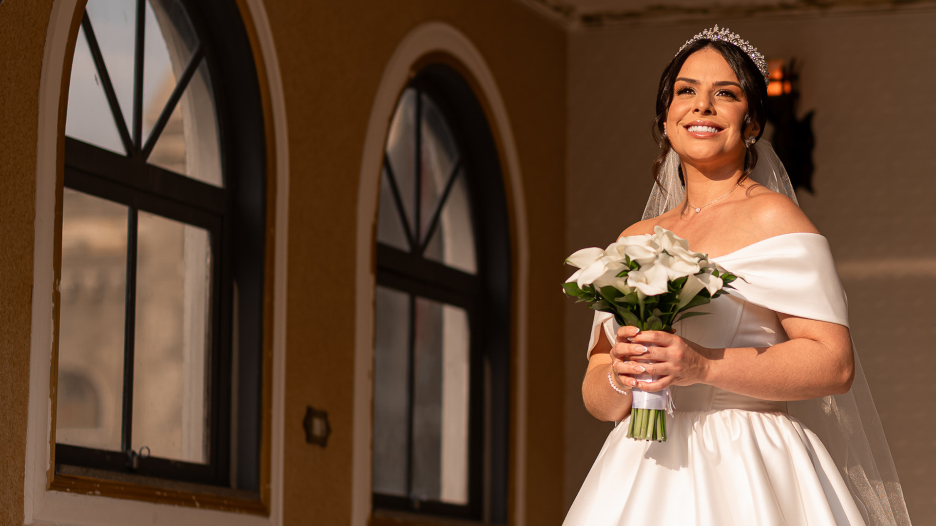 black and brown leather padded tub sofa