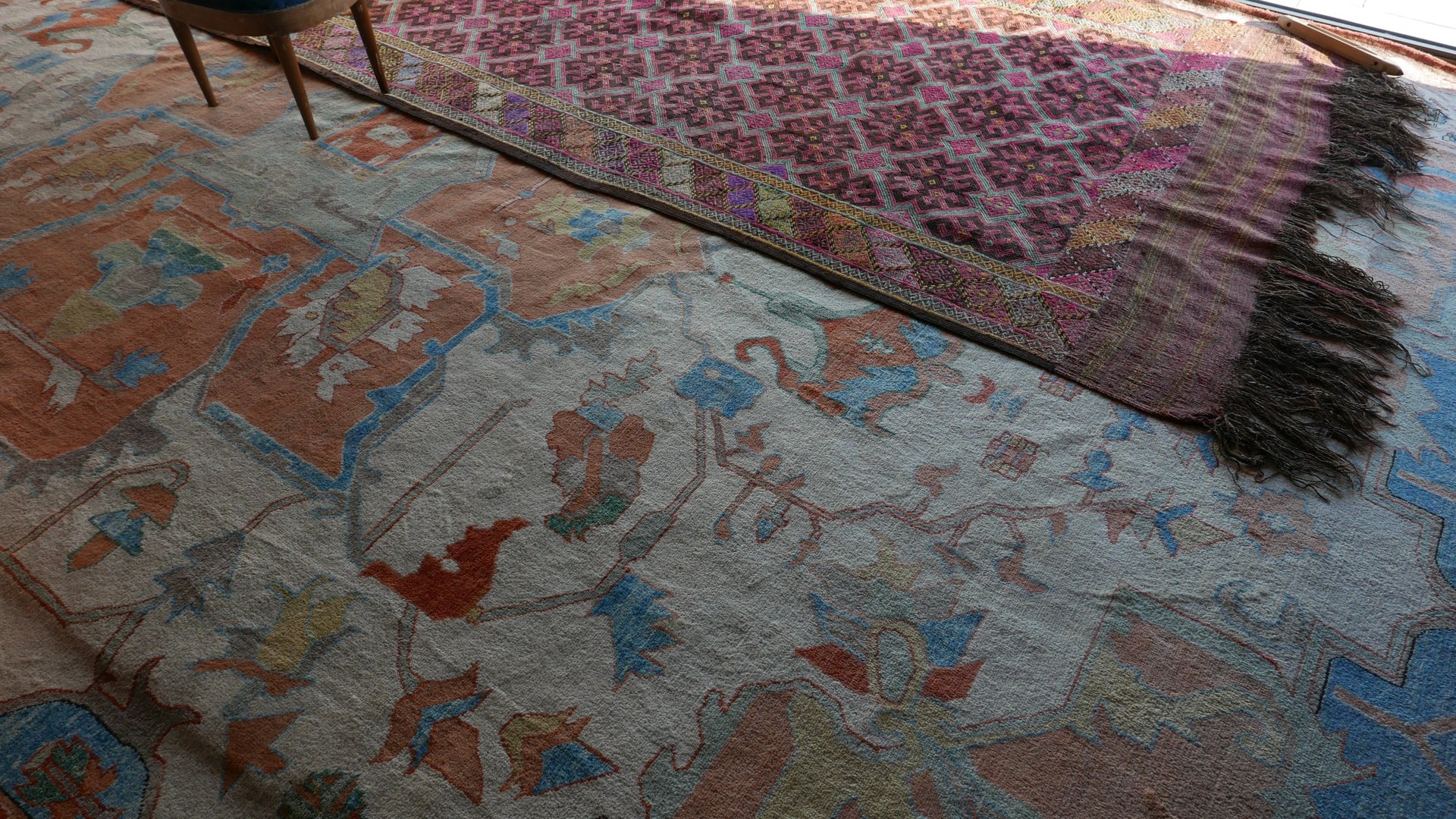 white bed by the window during daytime