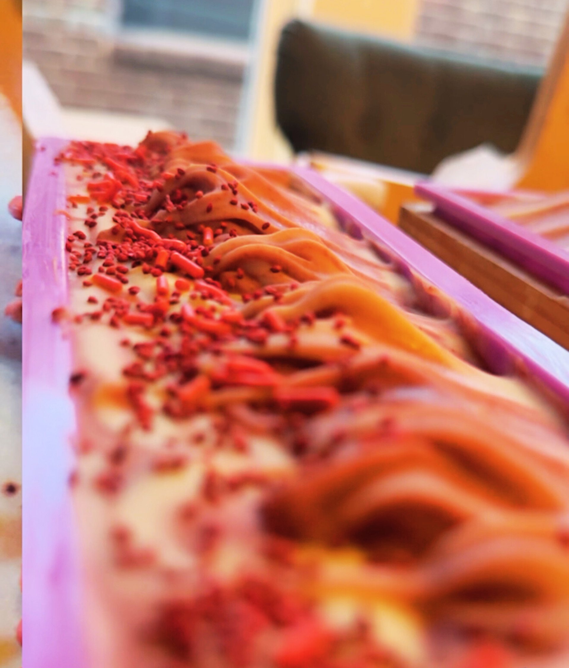 woman wearing yellow long-sleeved dress under white clouds and blue sky during daytime