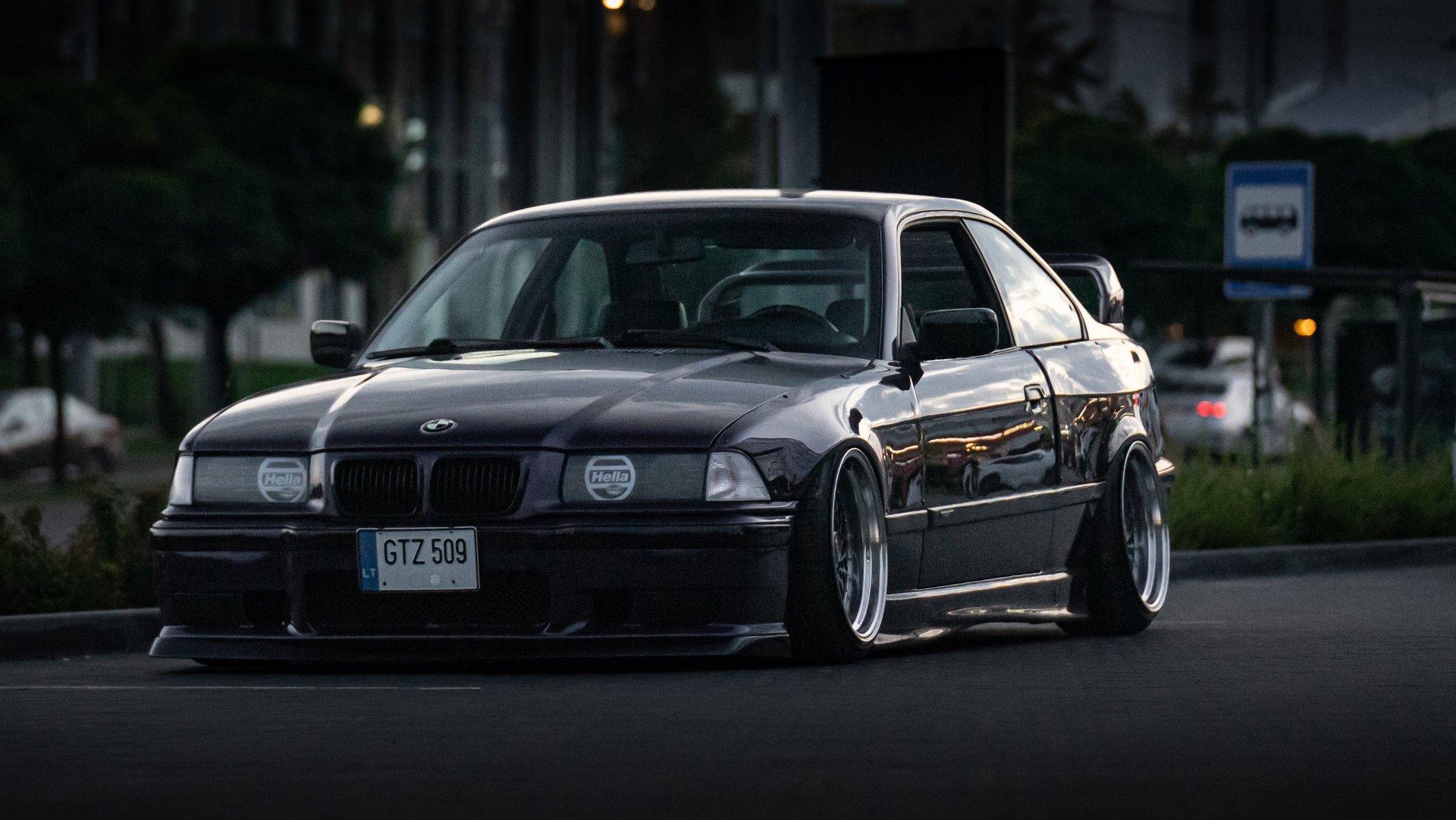 woman wearing yellow long-sleeved dress under white clouds and blue sky during daytime