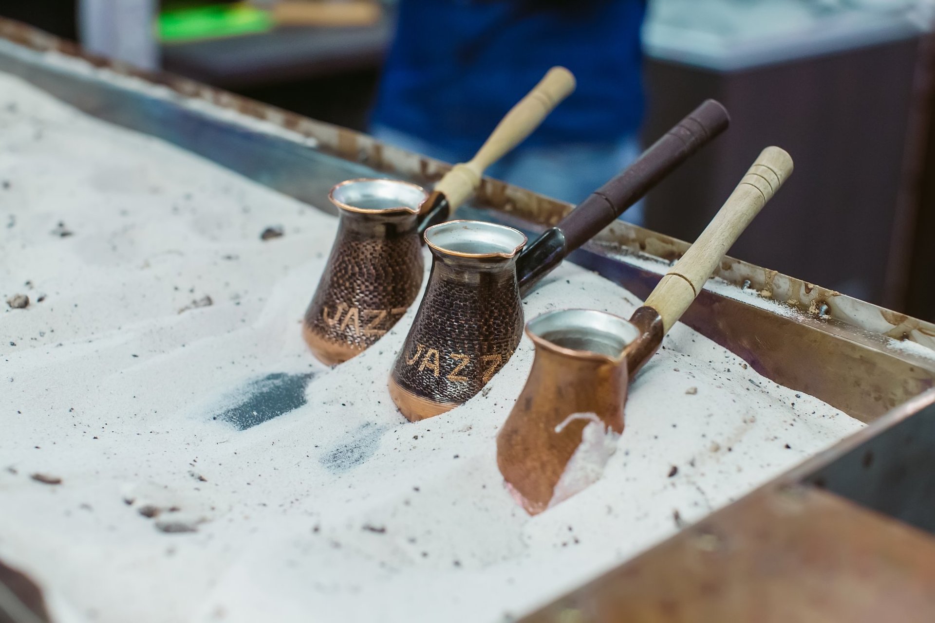 silhouette photography of two coconut trees near body water during golden hour