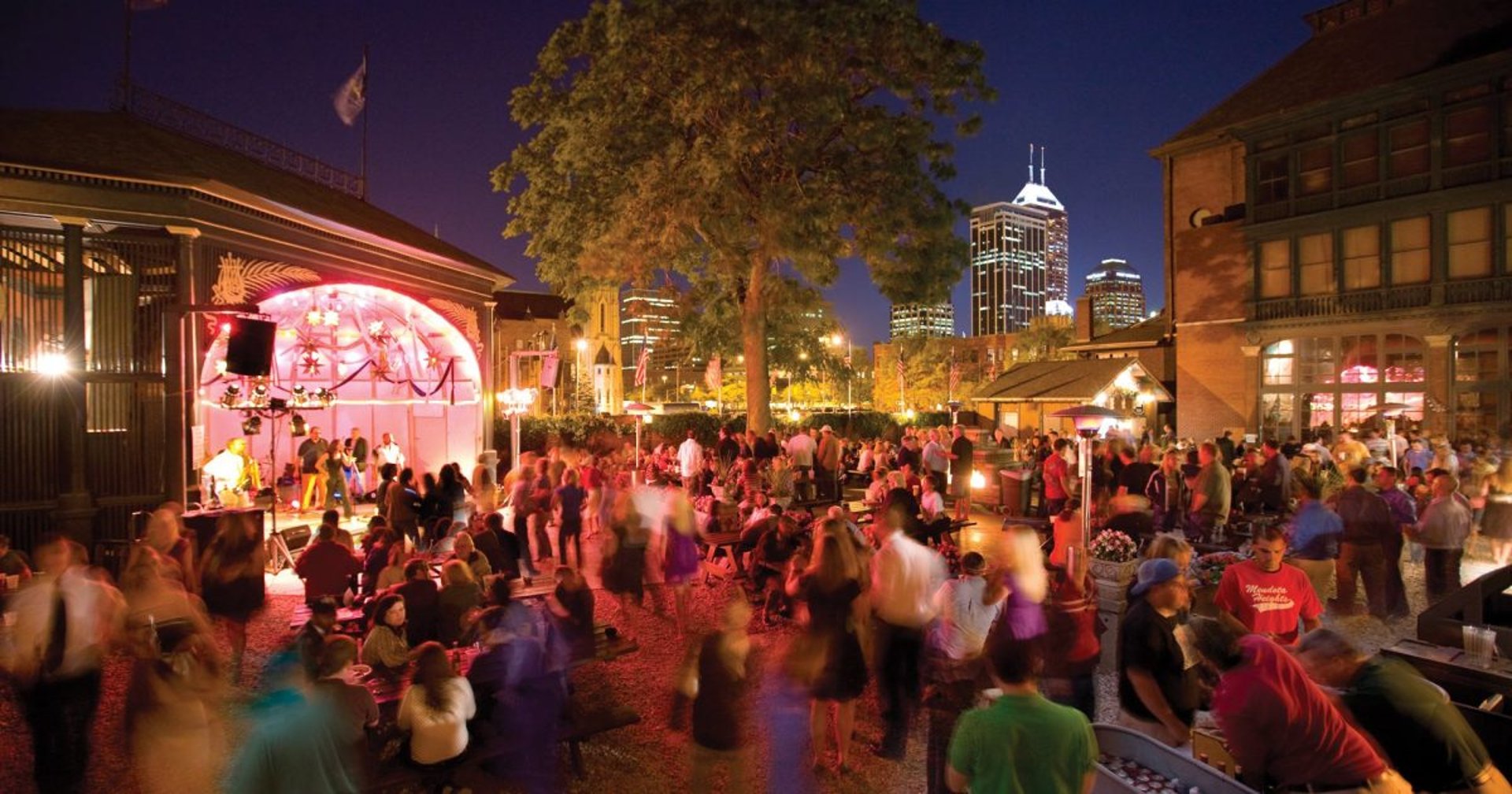 silhouette photography of two coconut trees near body water during golden hour
