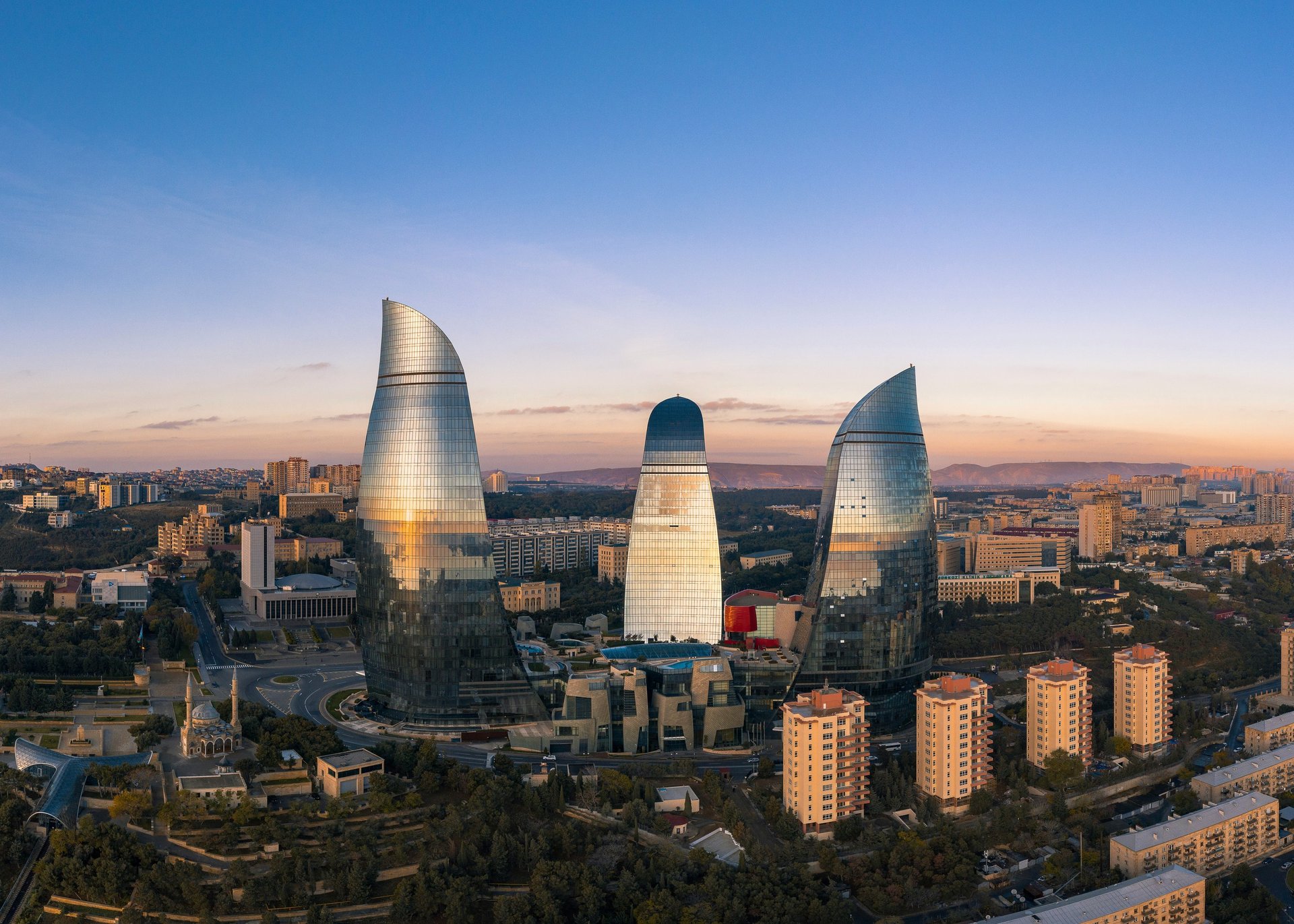 a large body of water with a city in the background