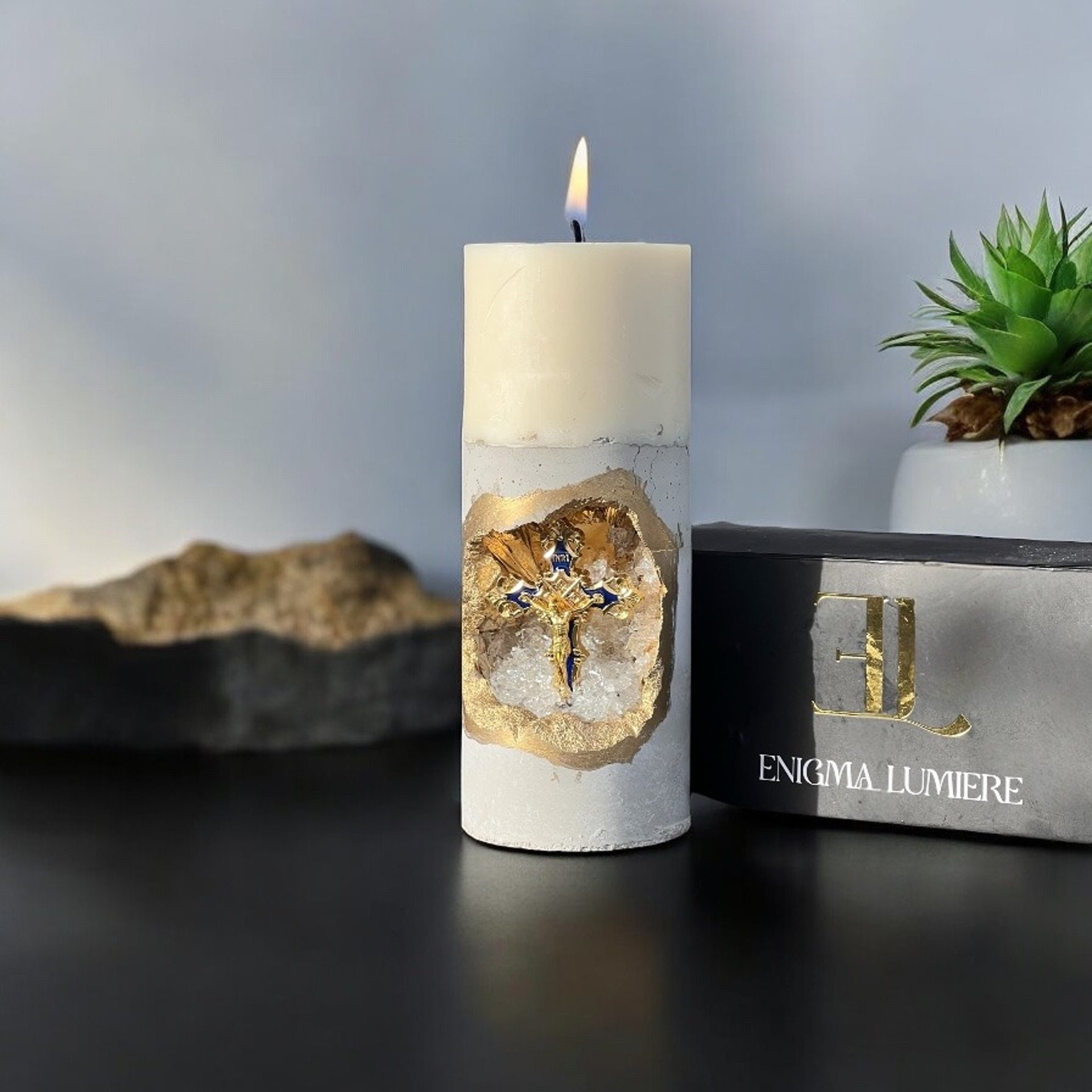 white candle on brown wooden table