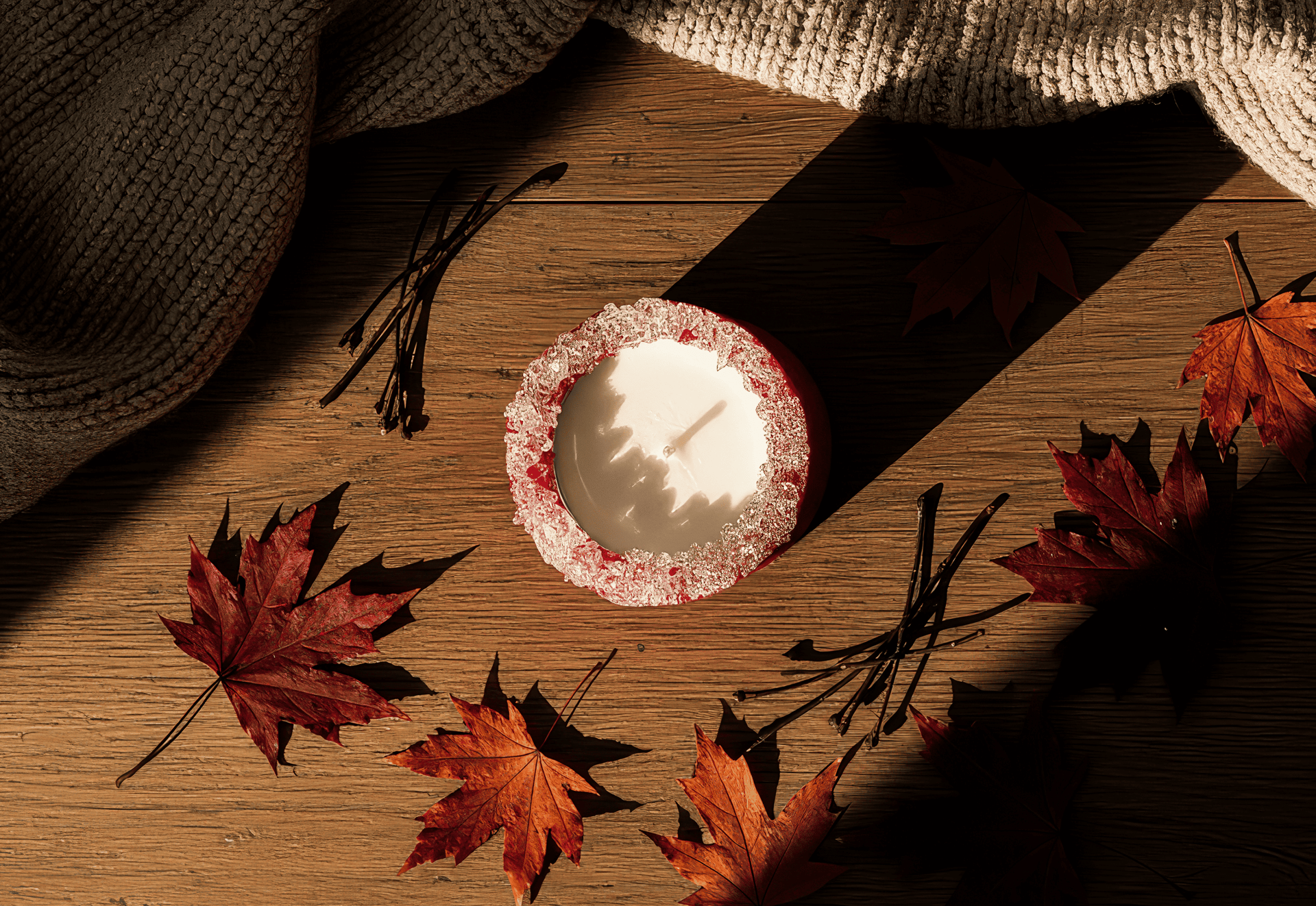 white candle on brown wooden table