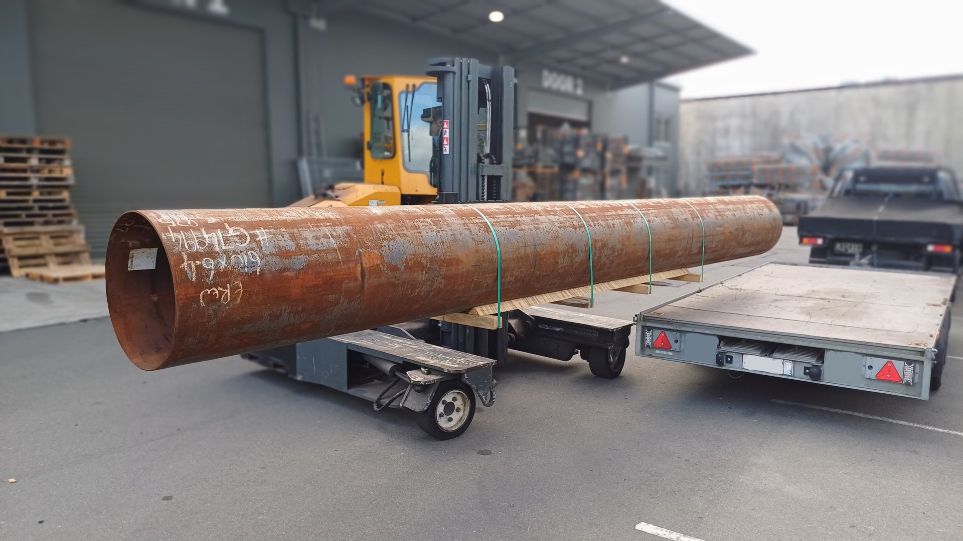 loading the Materials to build a custom bbq smoker onto a trailer