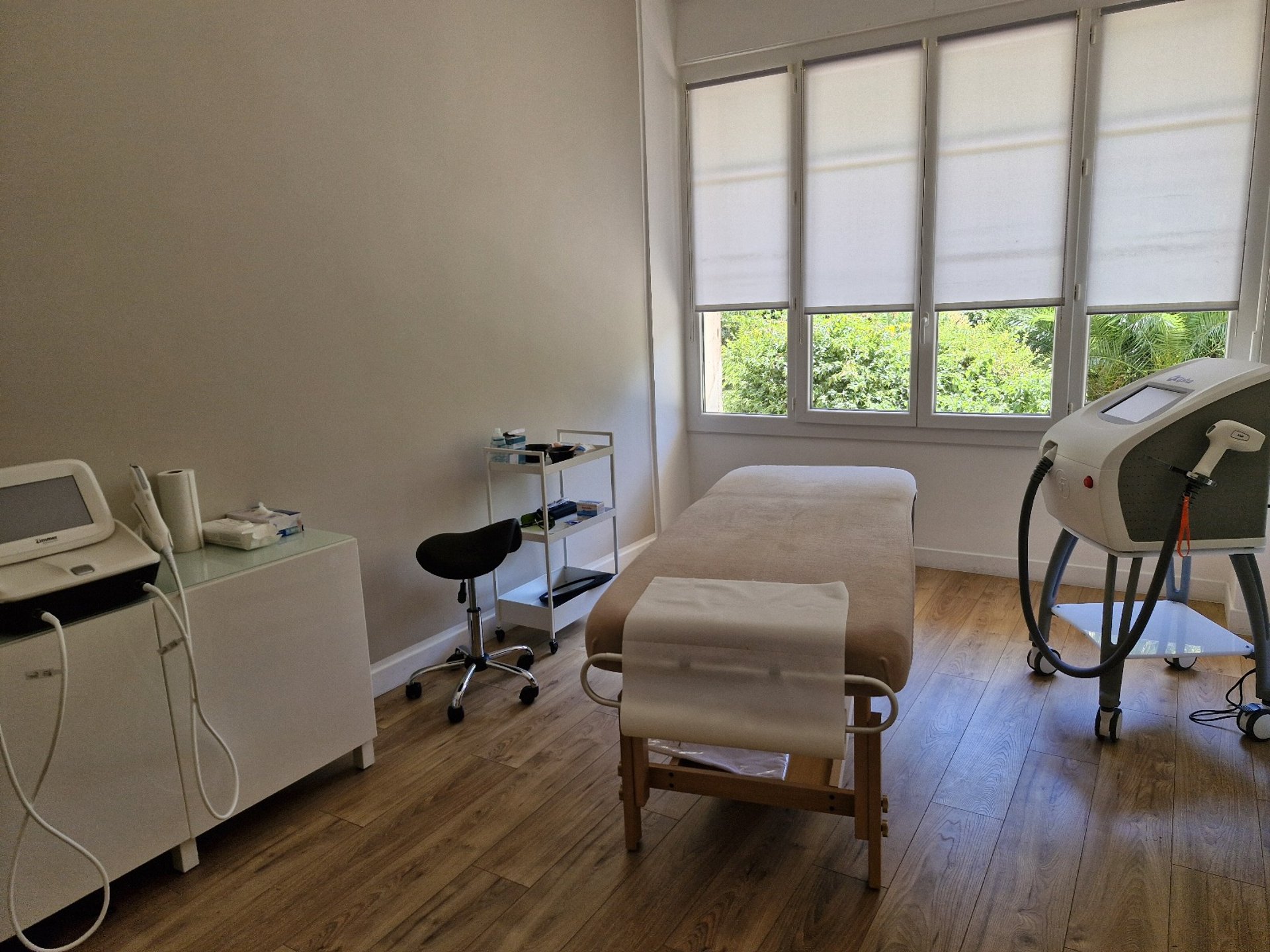 a woman getting a facial peel from a doctor