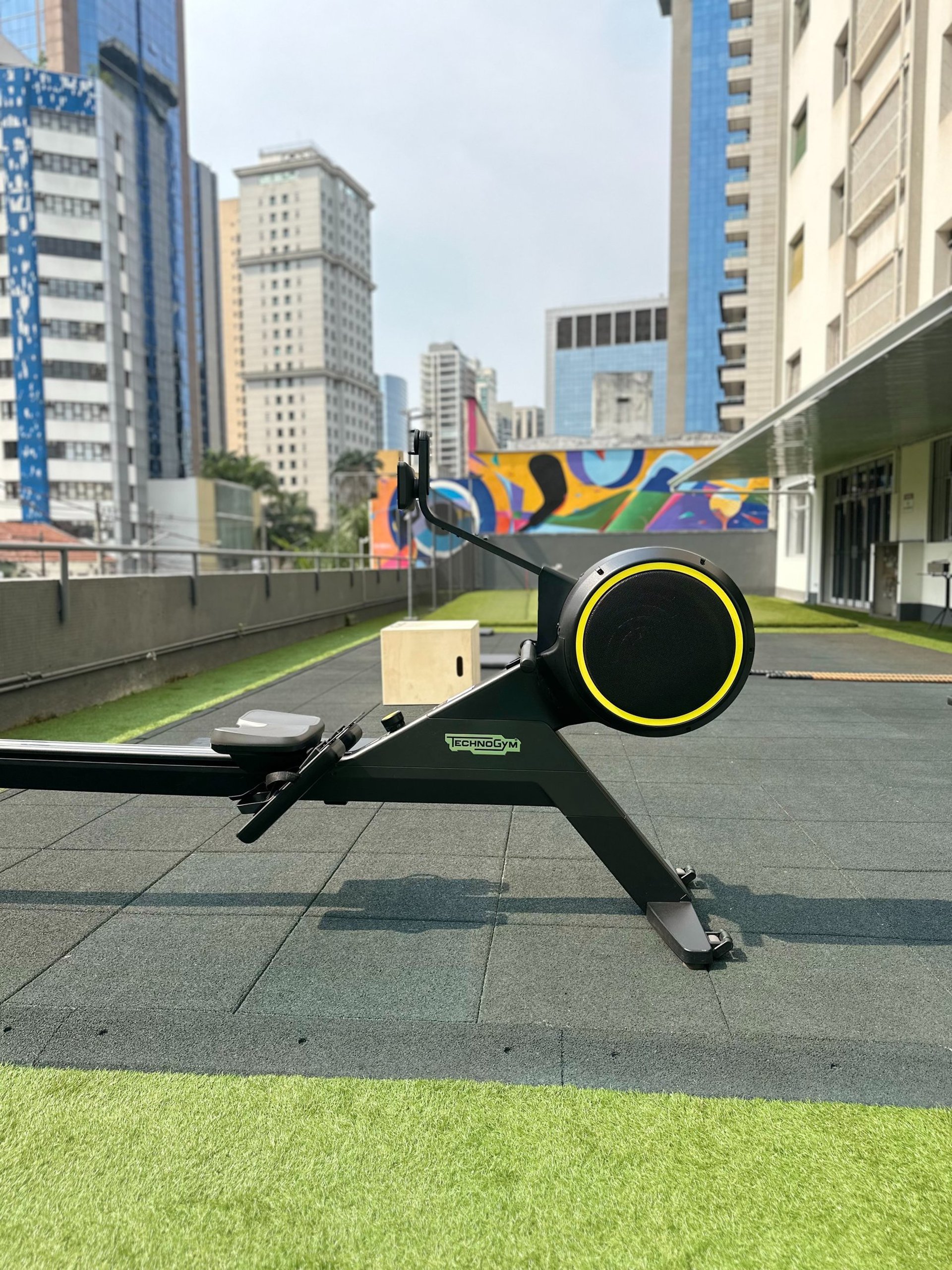 an abstract photo of a curved building with a blue sky in the background