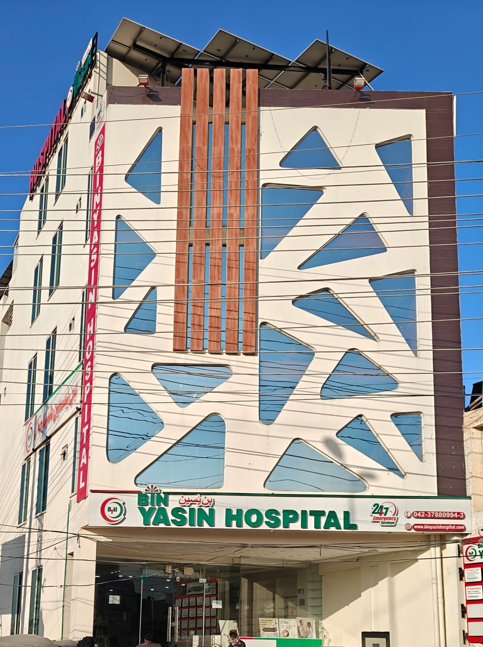 woman wearing yellow long-sleeved dress under white clouds and blue sky during daytime
