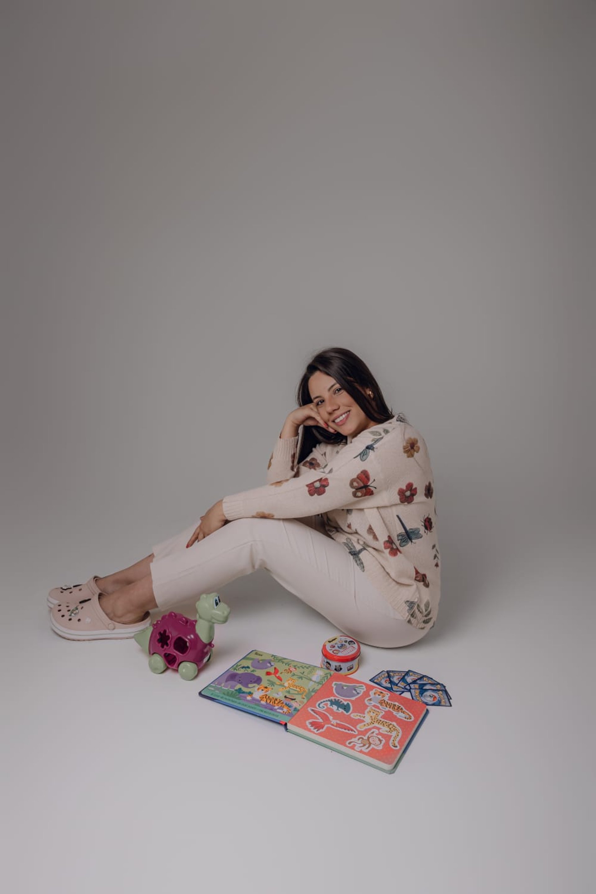 woman wearing yellow long-sleeved dress under white clouds and blue sky during daytime