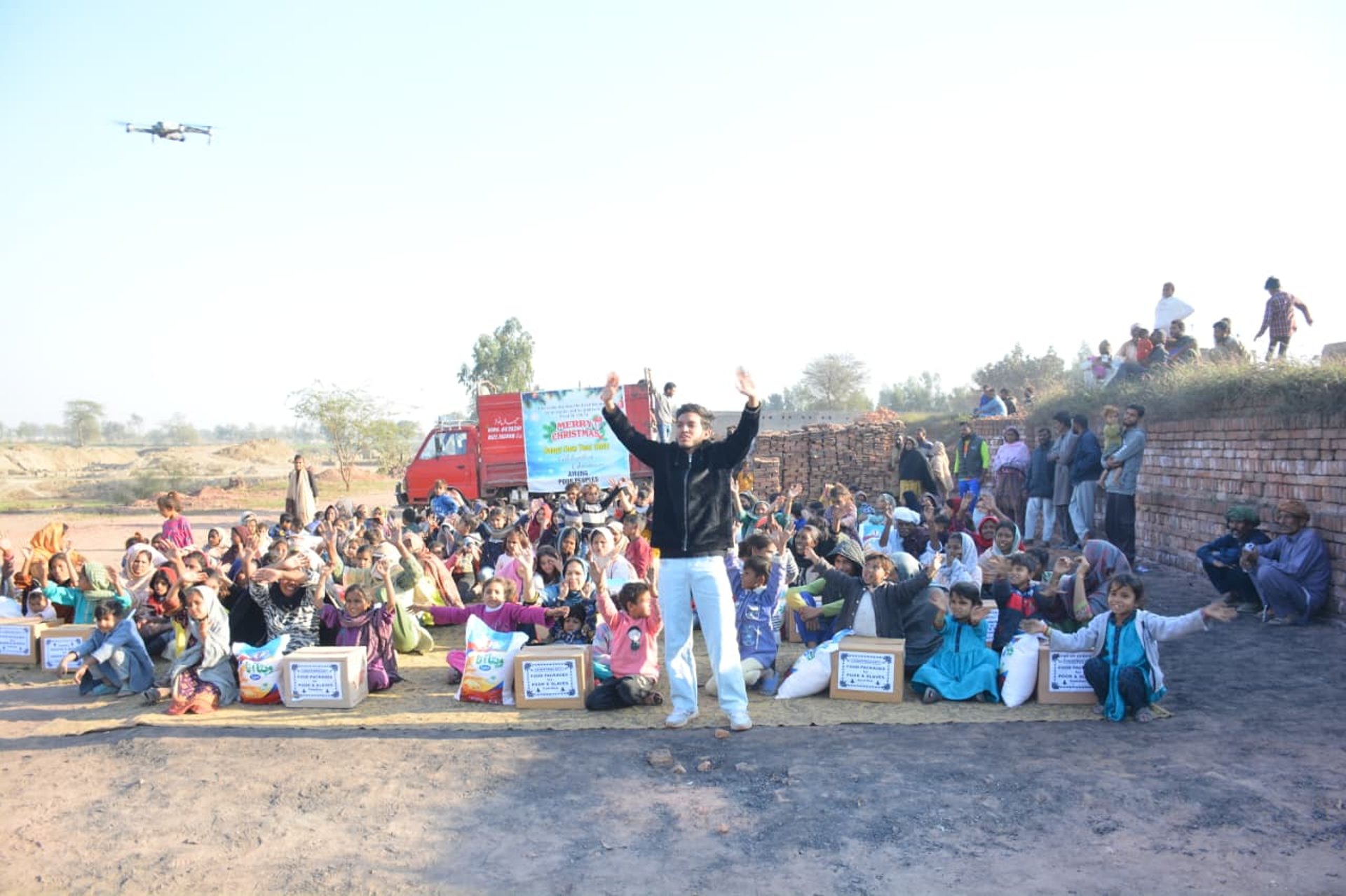 woman wearing yellow long-sleeved dress under white clouds and blue sky during daytime
